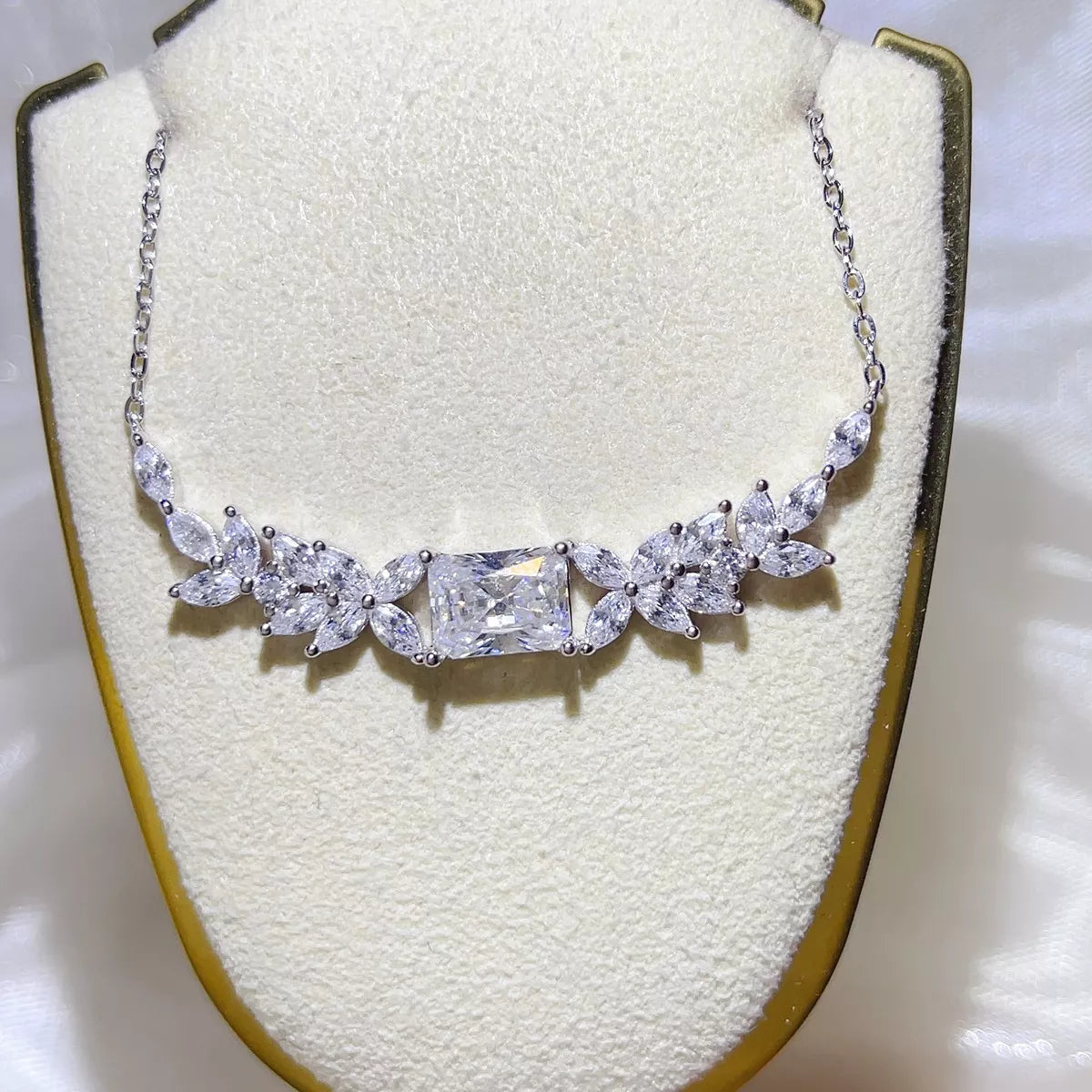 Starglow 2 carat moissanite necklace on a sterling silver chain, front view