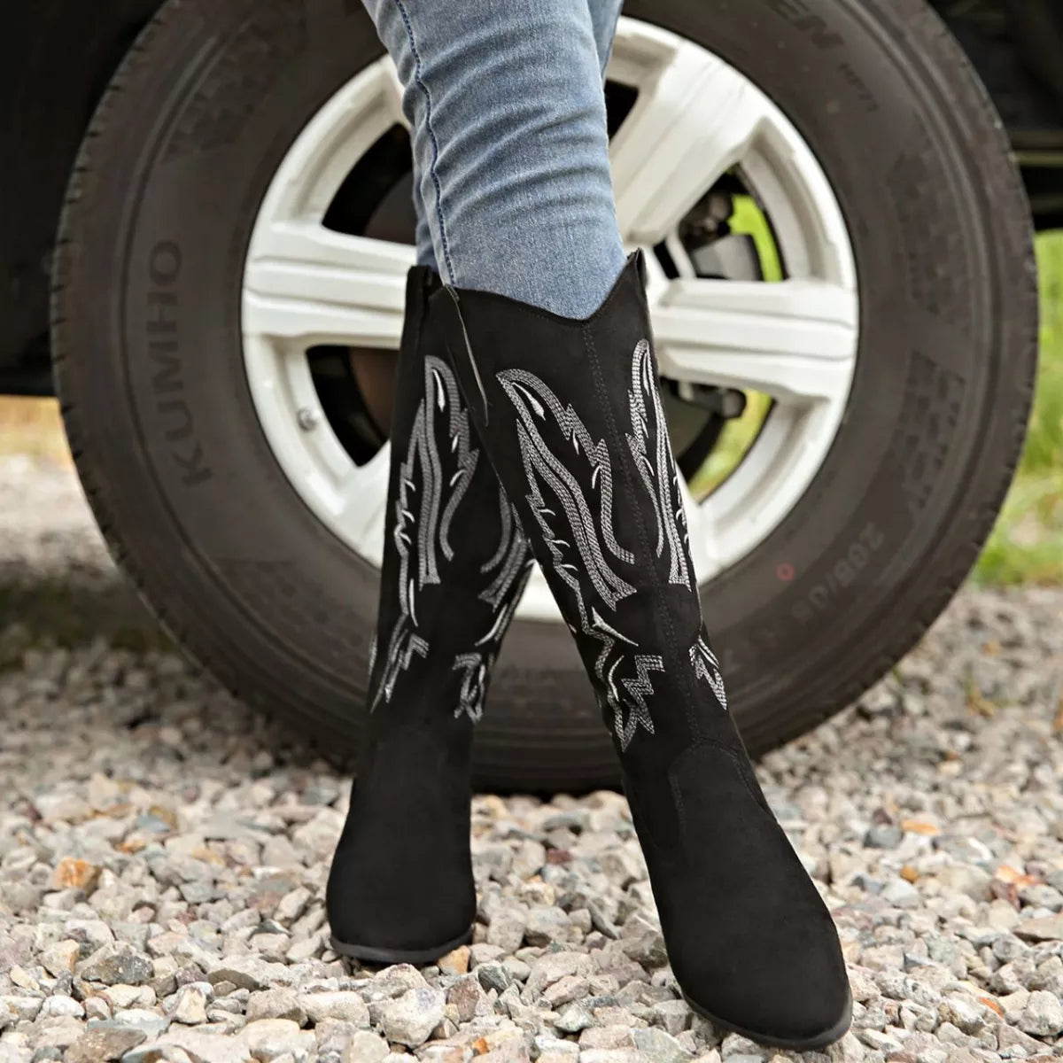 Point toe block heels boots angled three quarter view