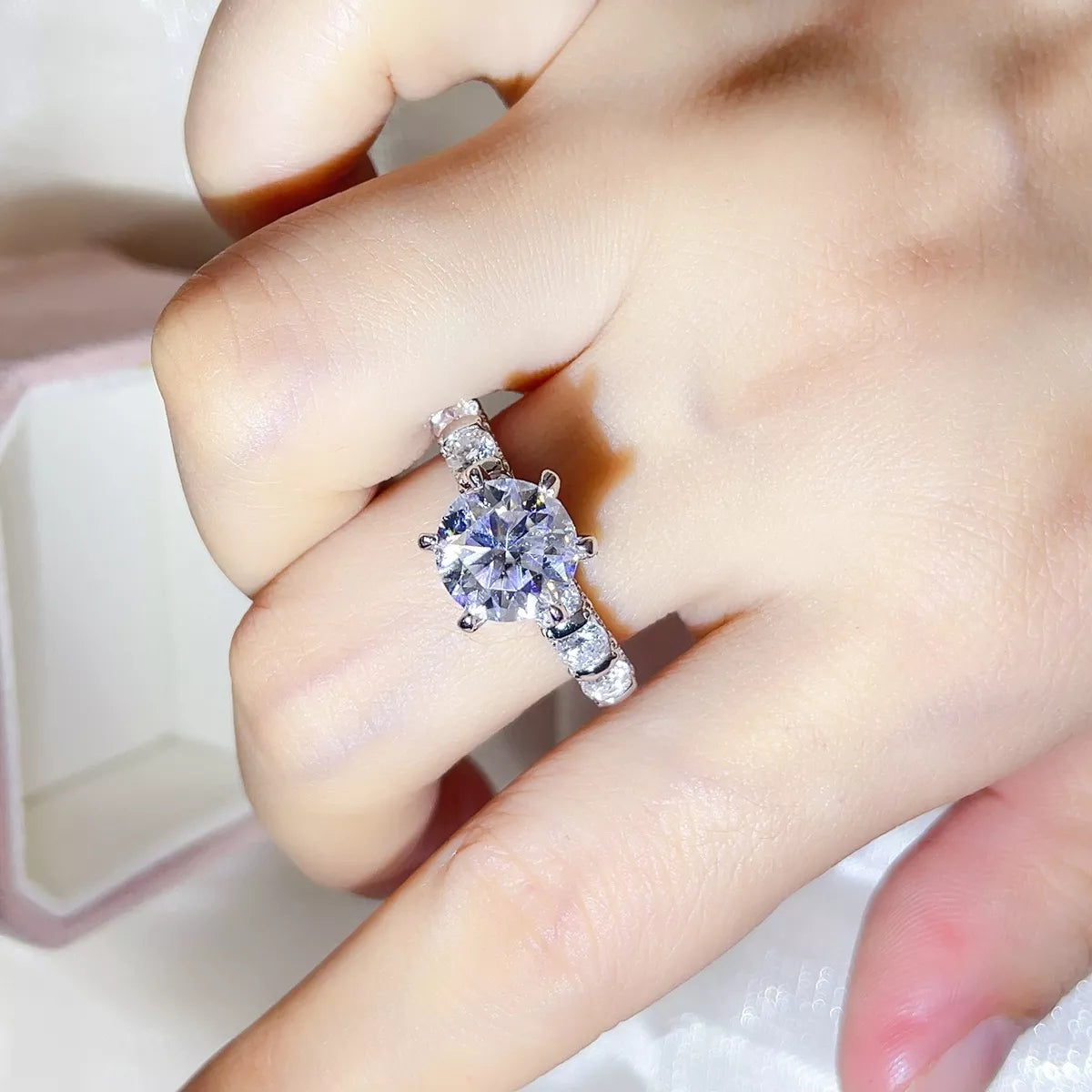 Close up of the brilliant moissanite stone and setting
