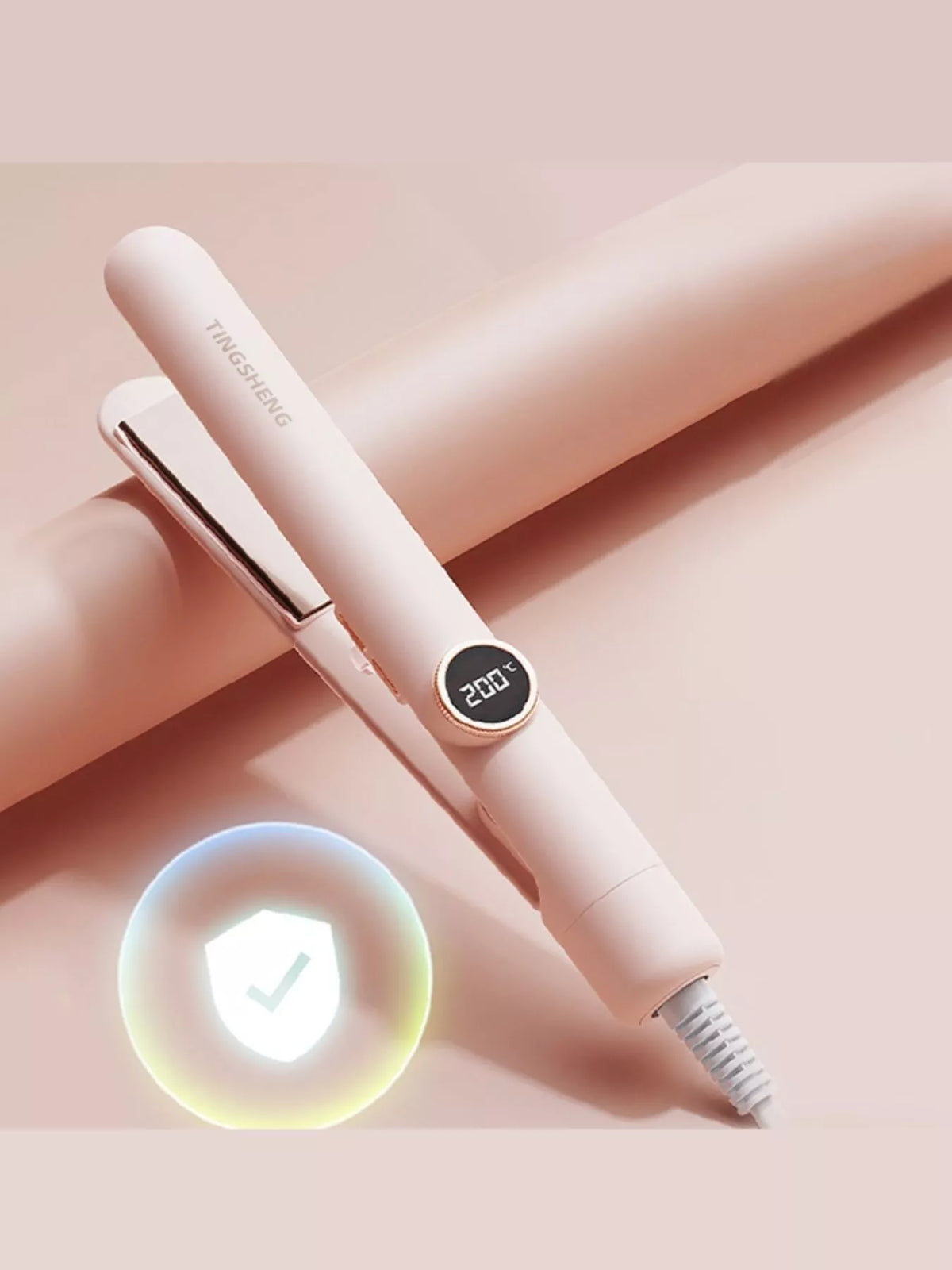 Straightener smoothing a strand of hair