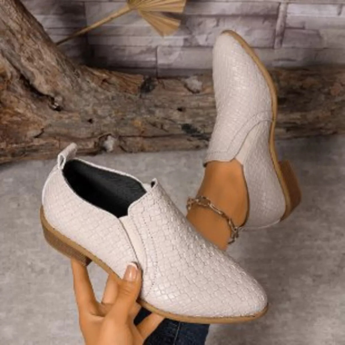 Brown point toe block heels ankle boots worn on model