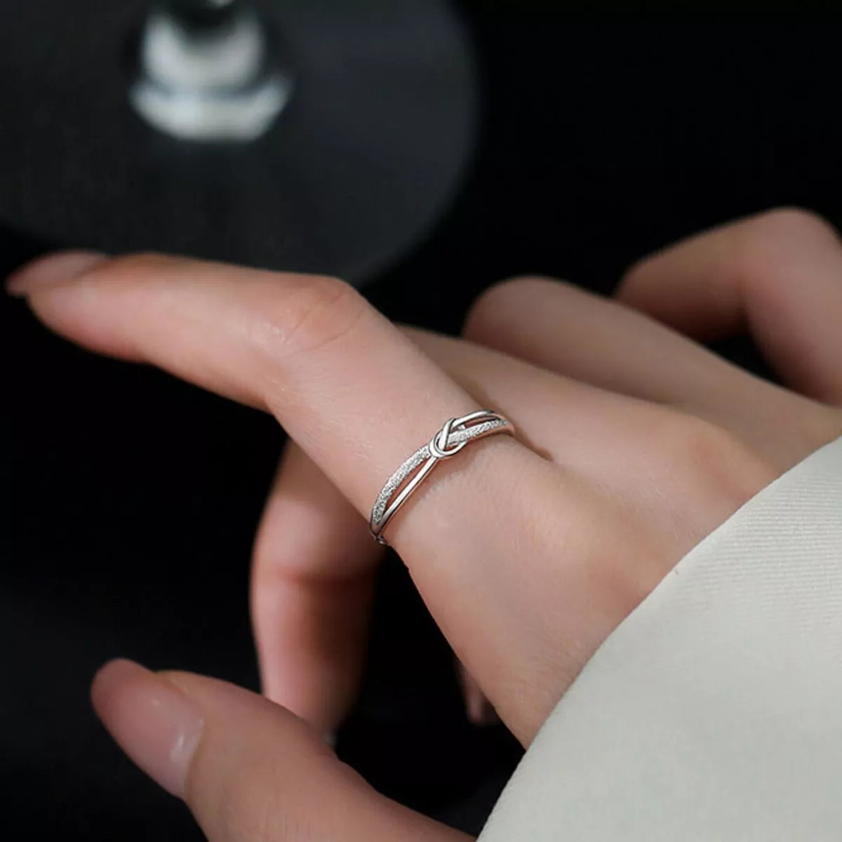 Sterling silver zircon knot ring front view