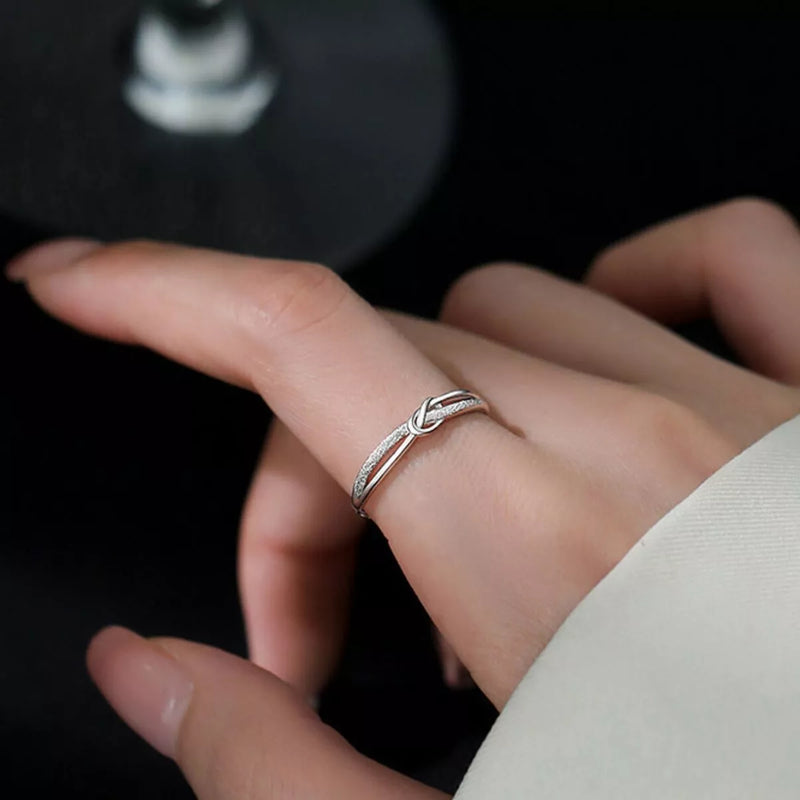 Sterling silver zircon knot ring front view