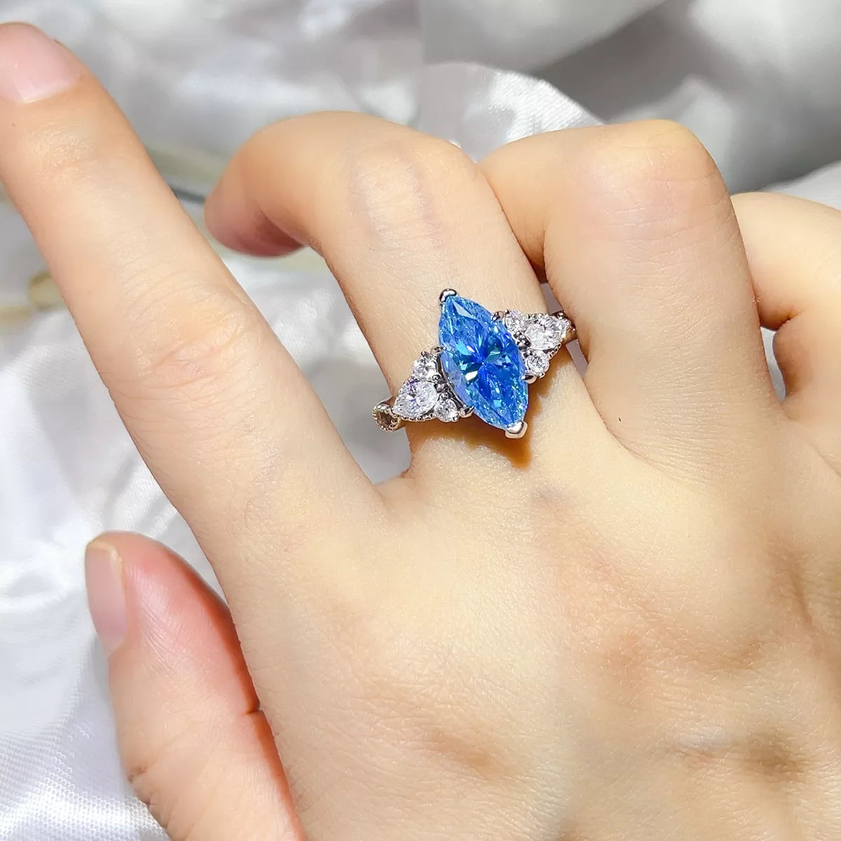 Starglow 3 carat pastel blue moissanite ring in sterling silver