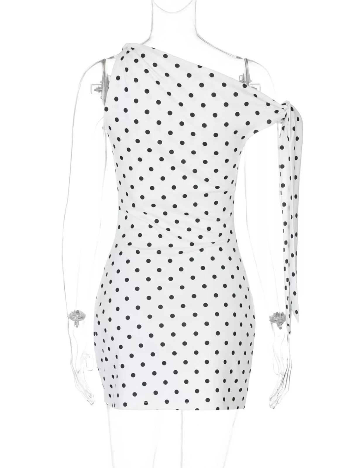 Bow detail at the shoulder of the black polka dot dress