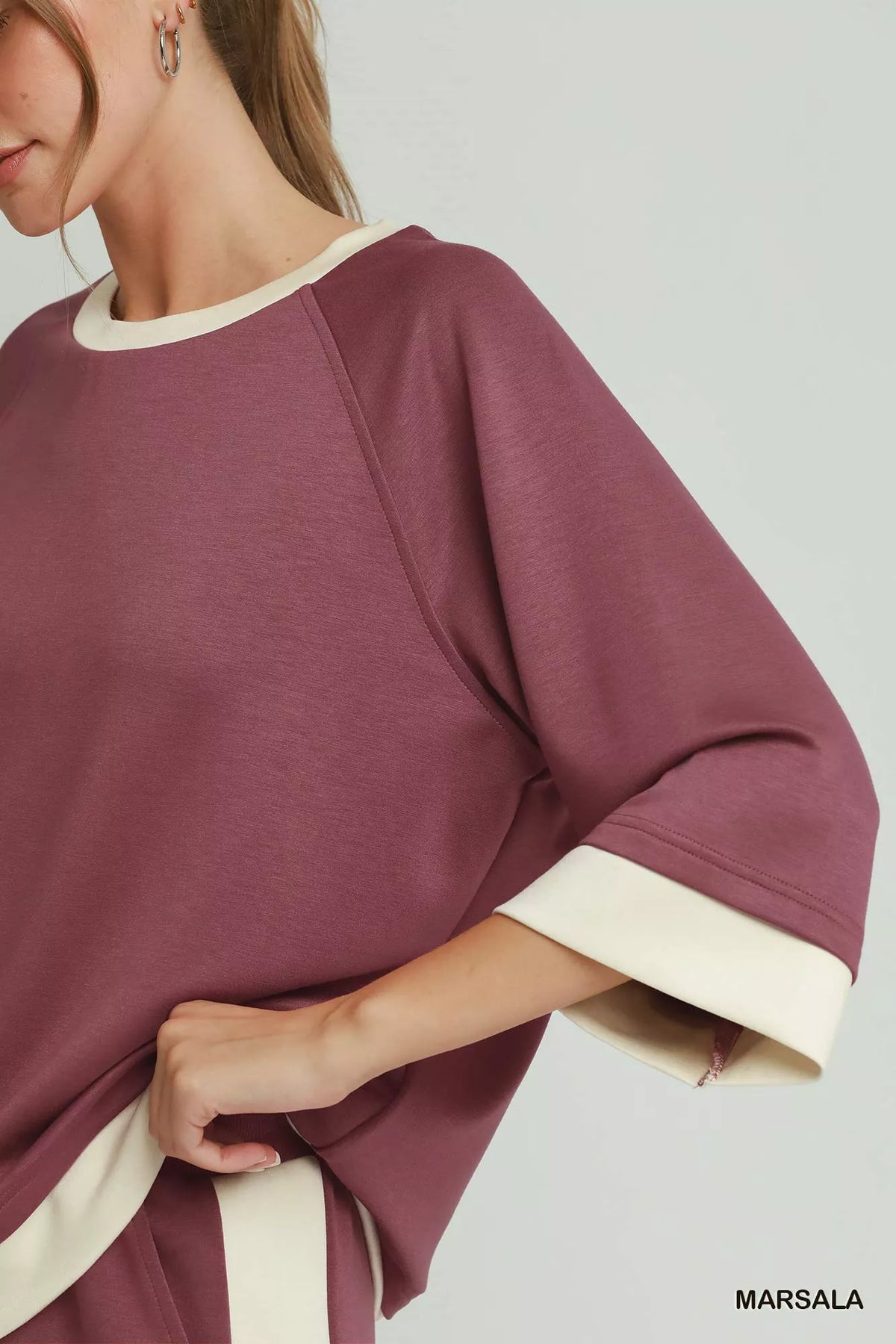 Umgee marsala colorblock raglan sleeve top side view