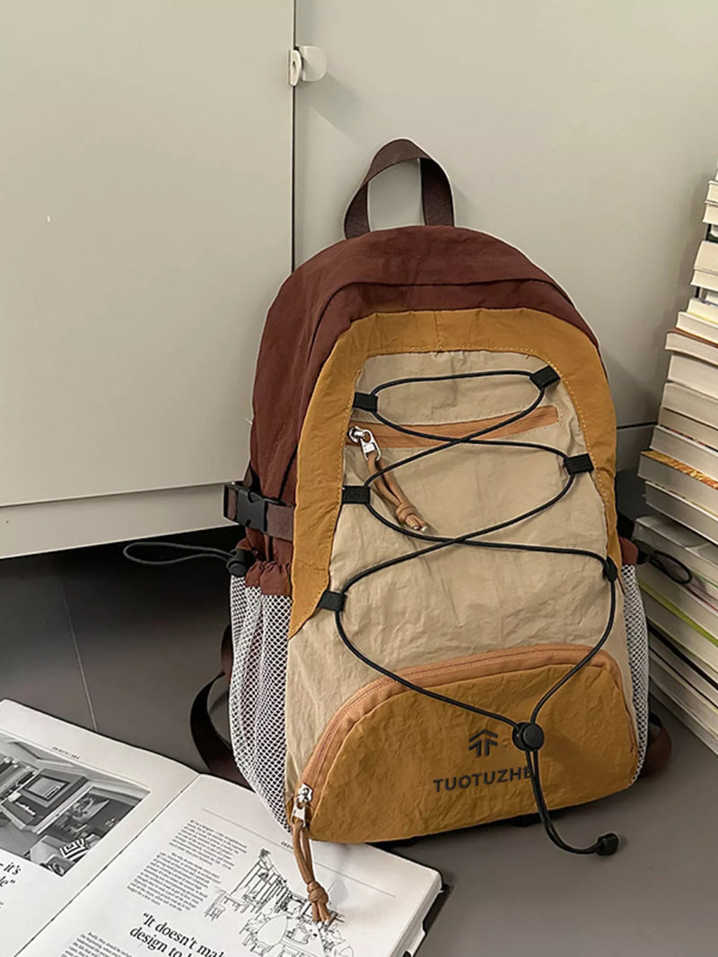 Orange color block nylon backpack front view