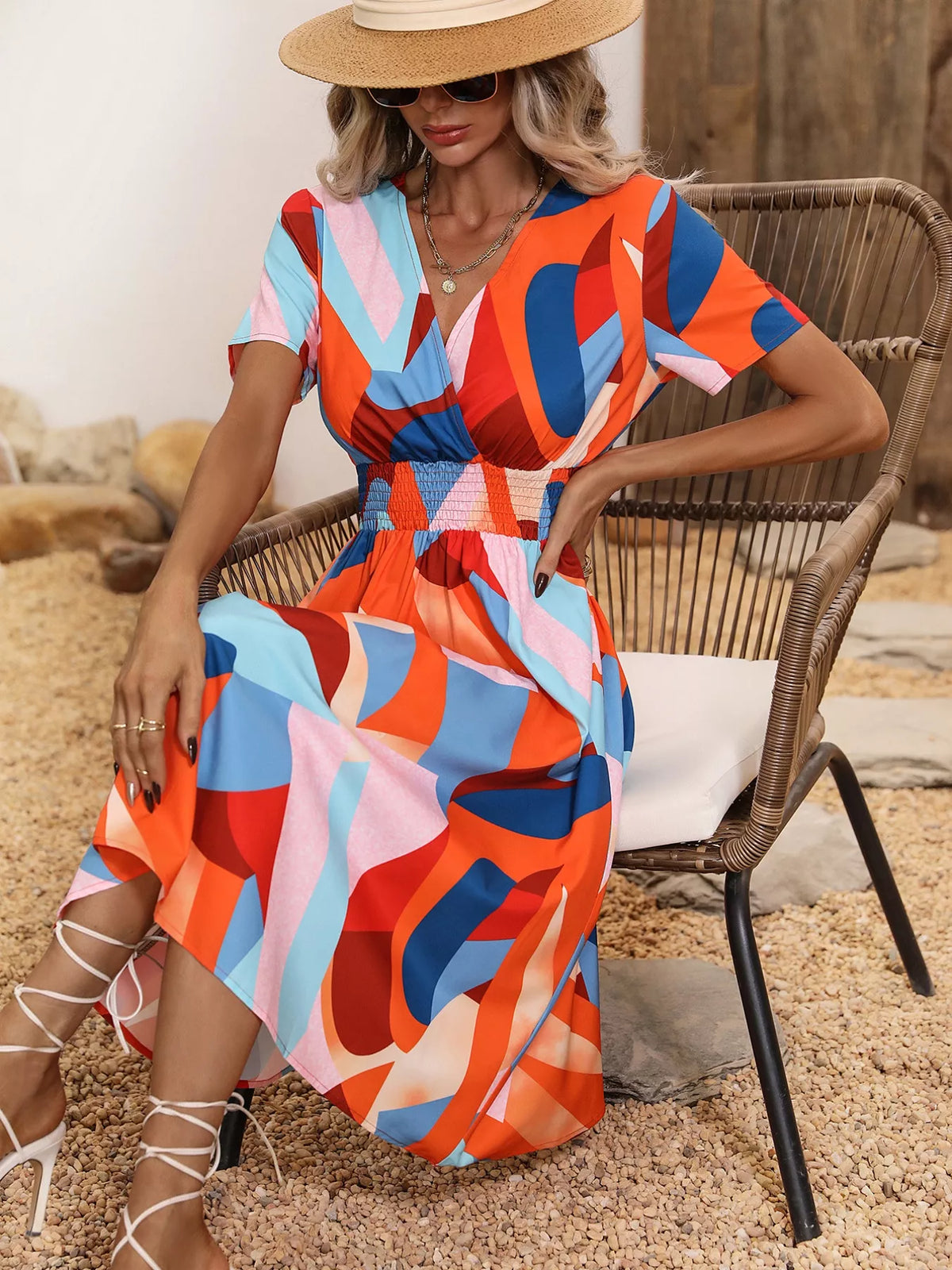 Printed short sleeve smocked midi dress detail view
