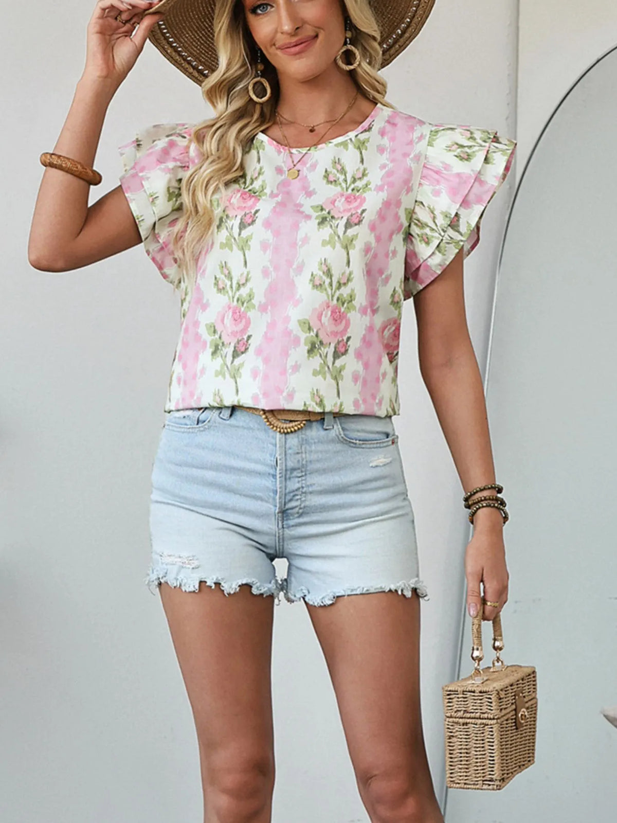 Blush pink floral blouse back view