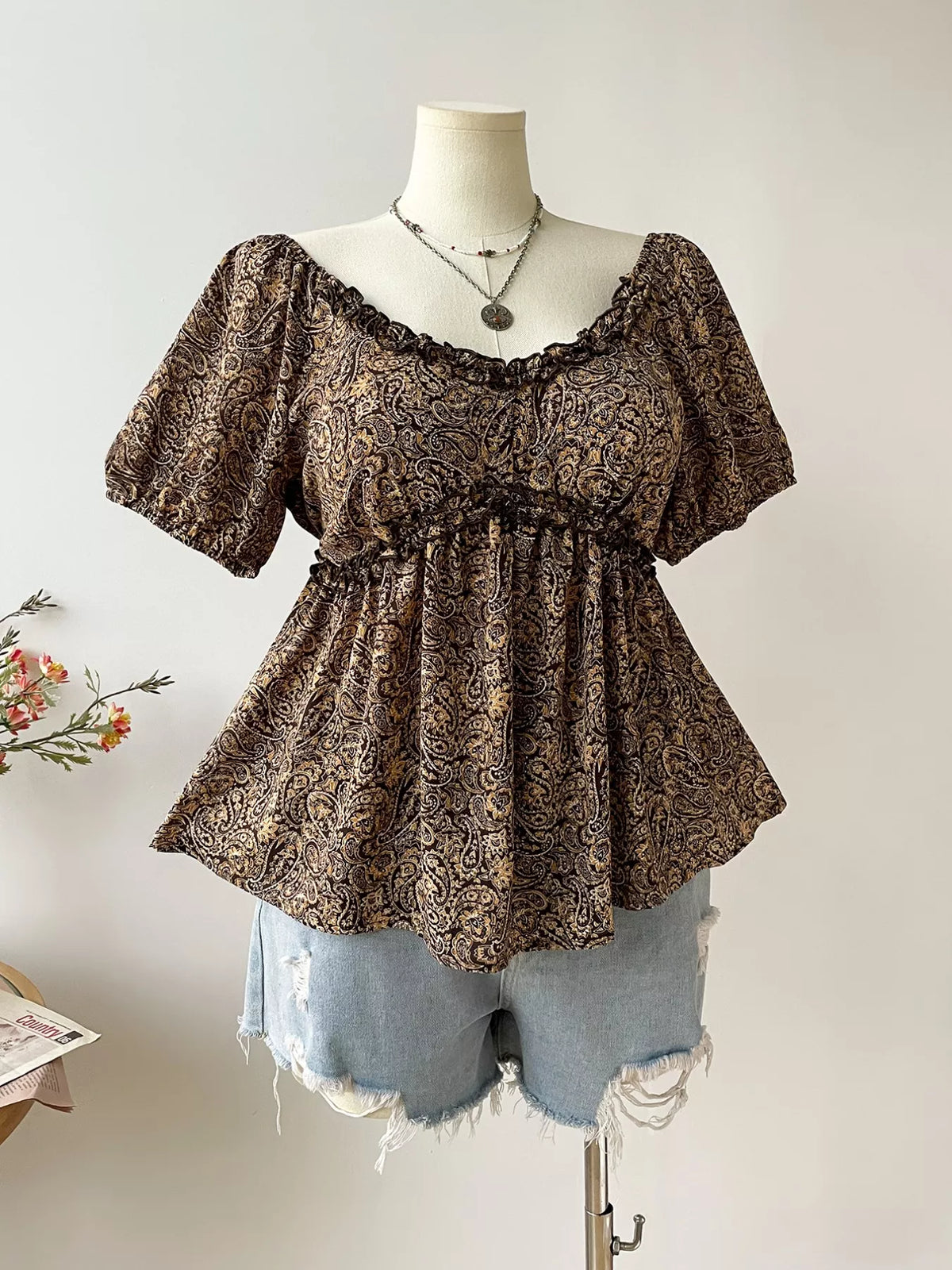 Short sleeve paisley print blouse side view