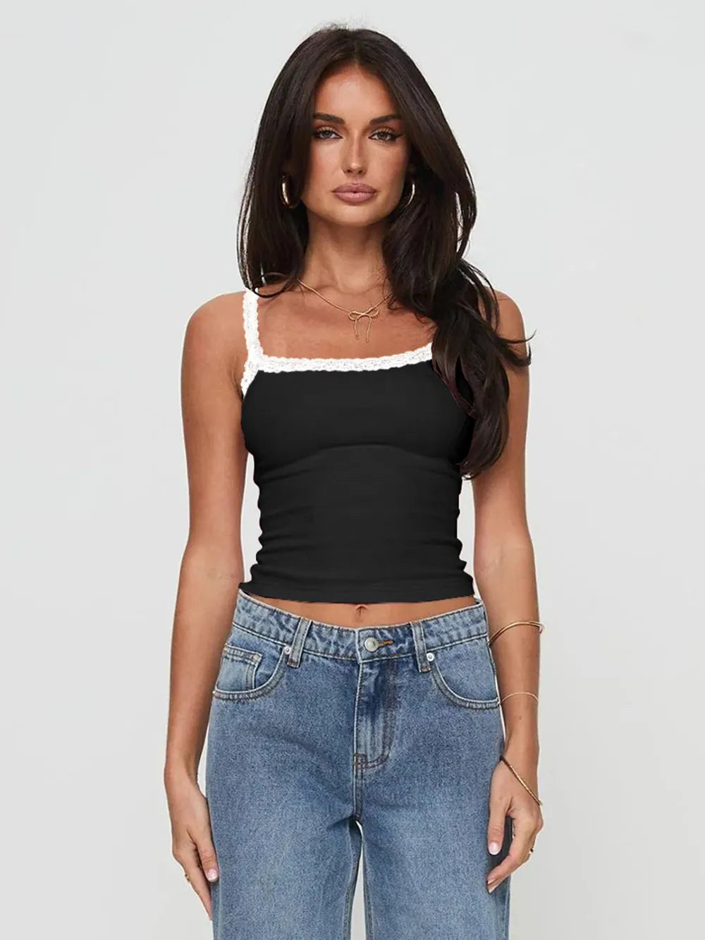 Woman wearing lace detail cropped cami top