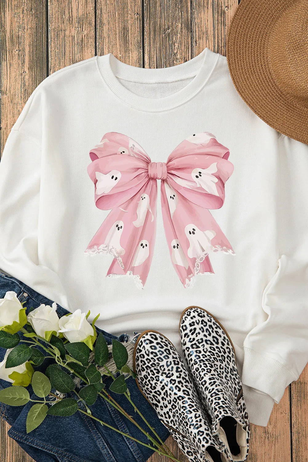 White sweatshirt with dainty bow accent detail