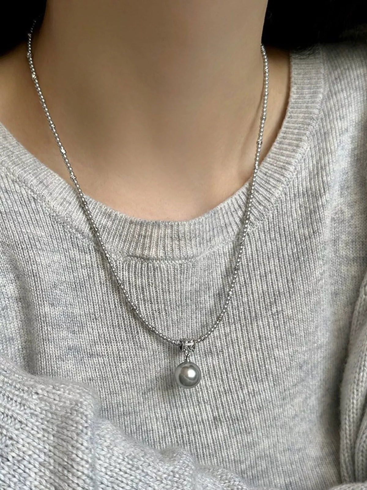pearl pendant necklace styled on model
