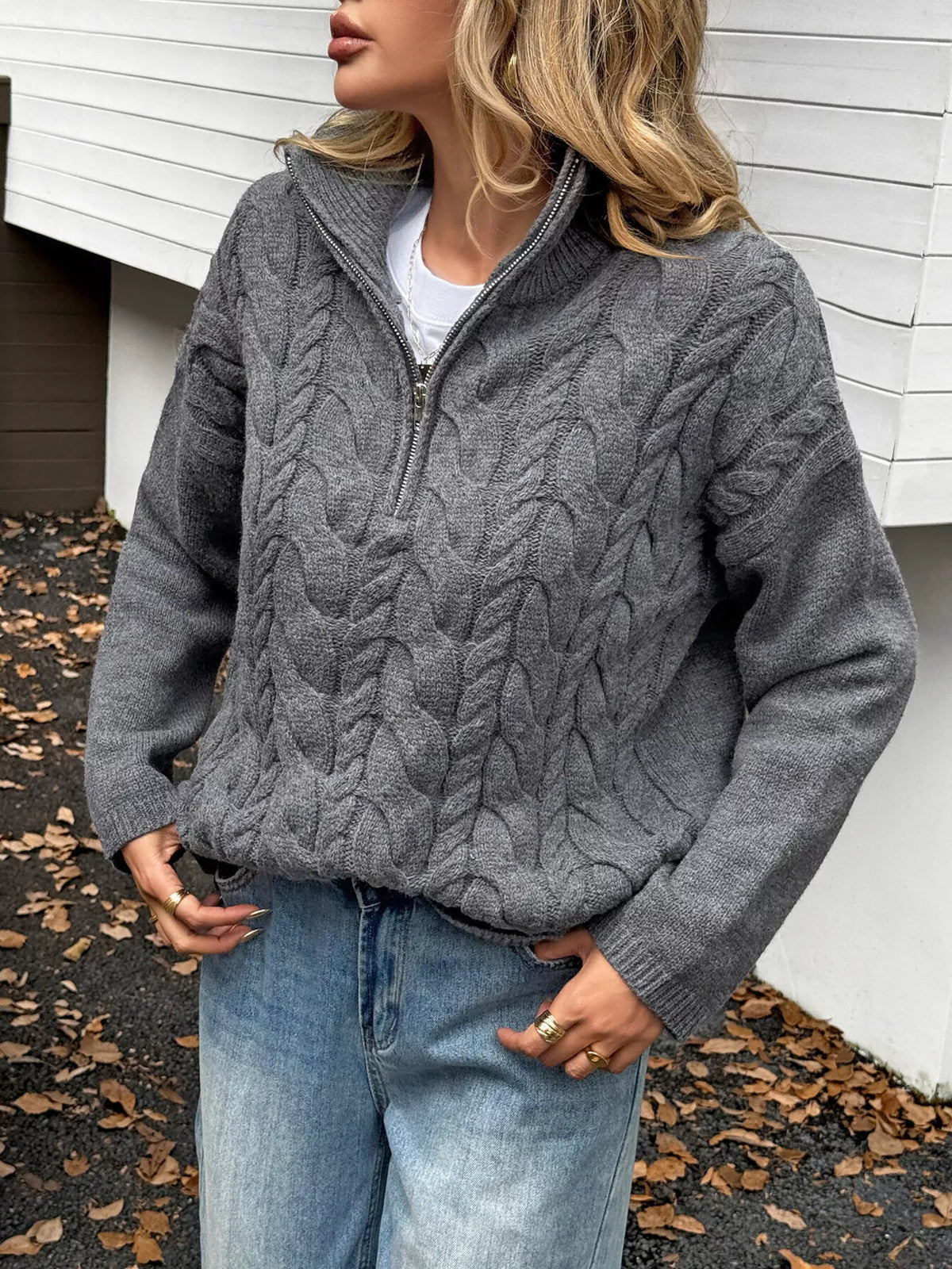 Zip collar cable knit sweater three quarter view