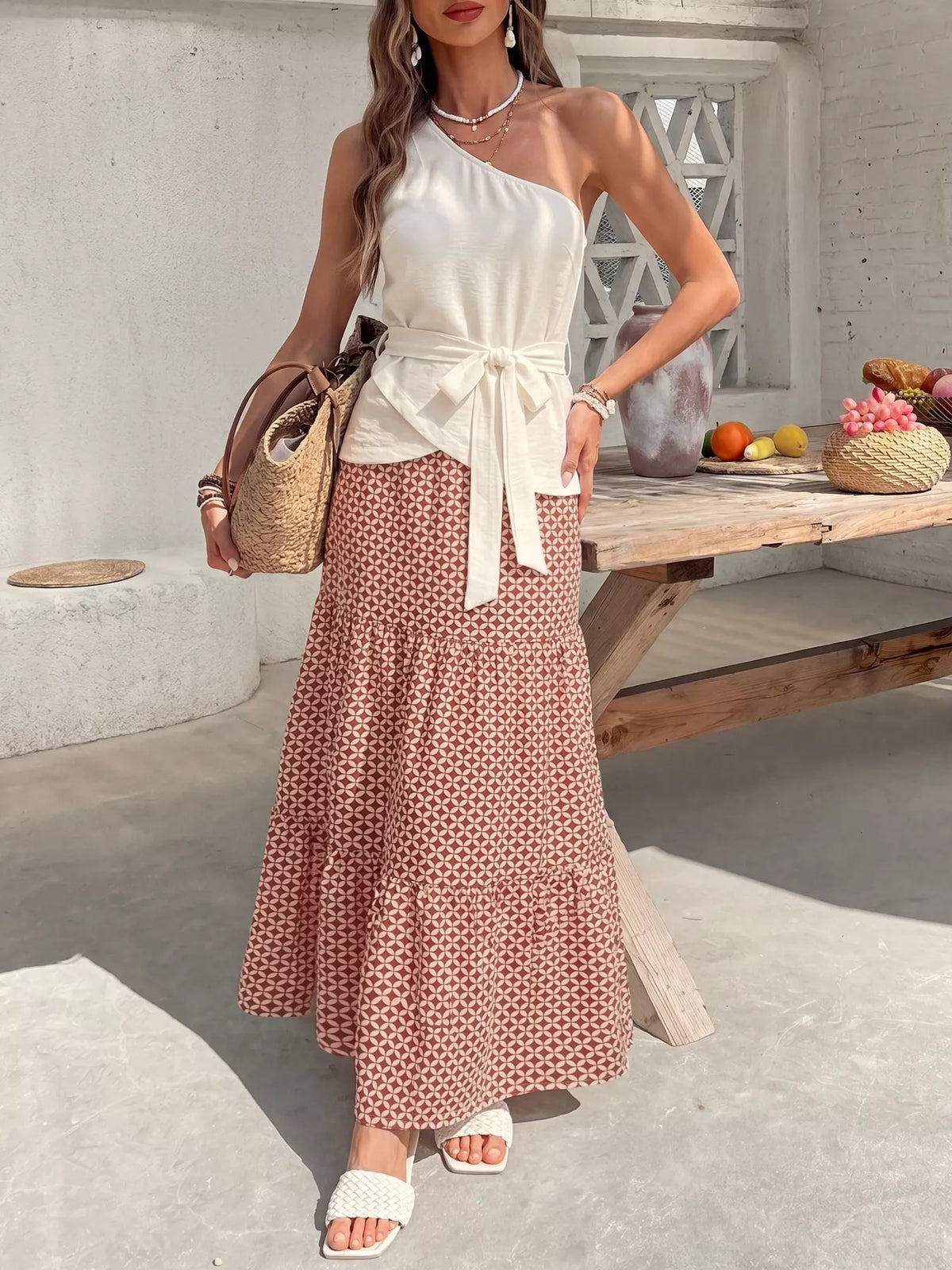 Cream one shoulder top and geometric maxi skirt set side view