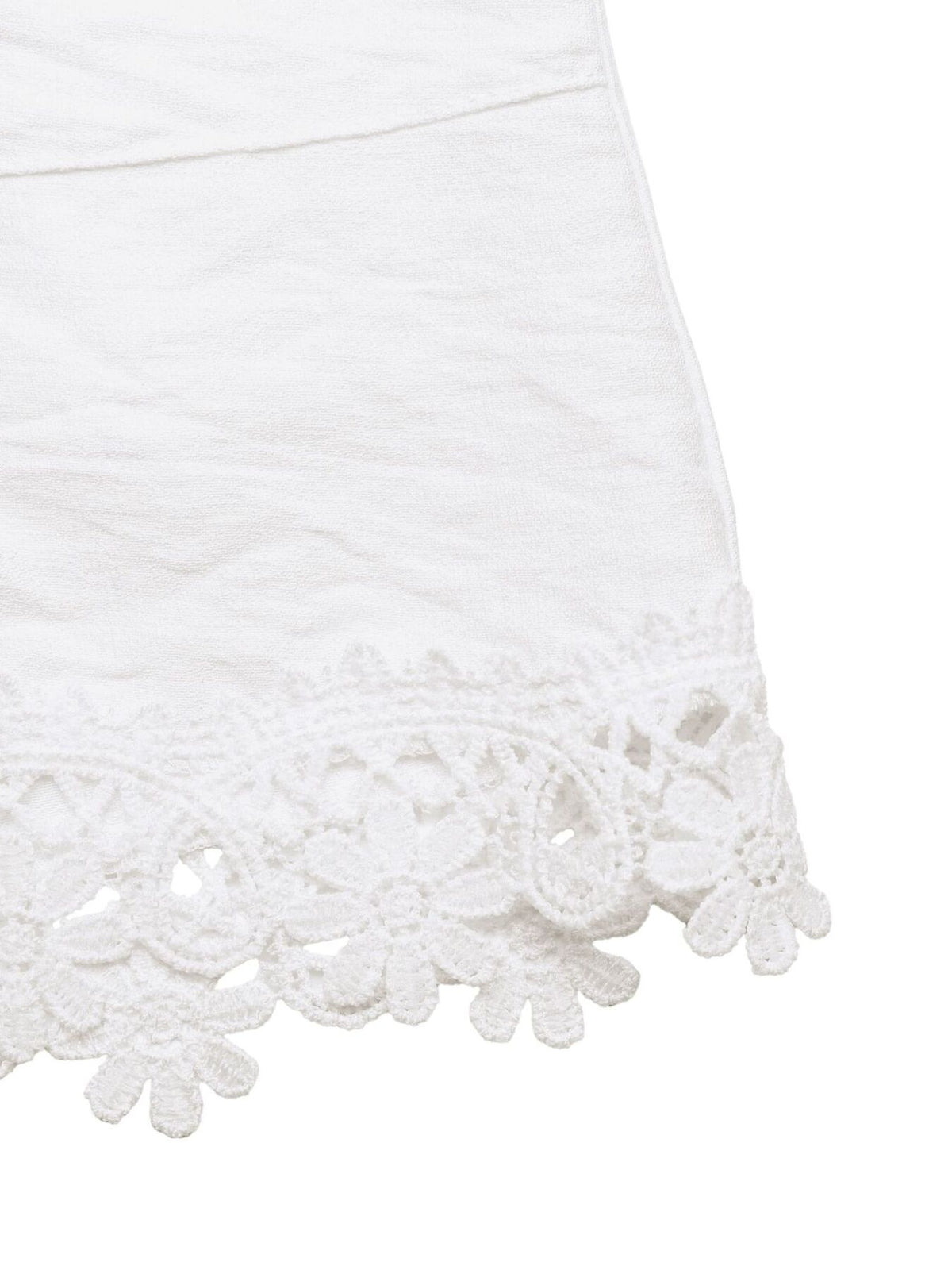 Hem and lace detail on ivory drawstring shorts