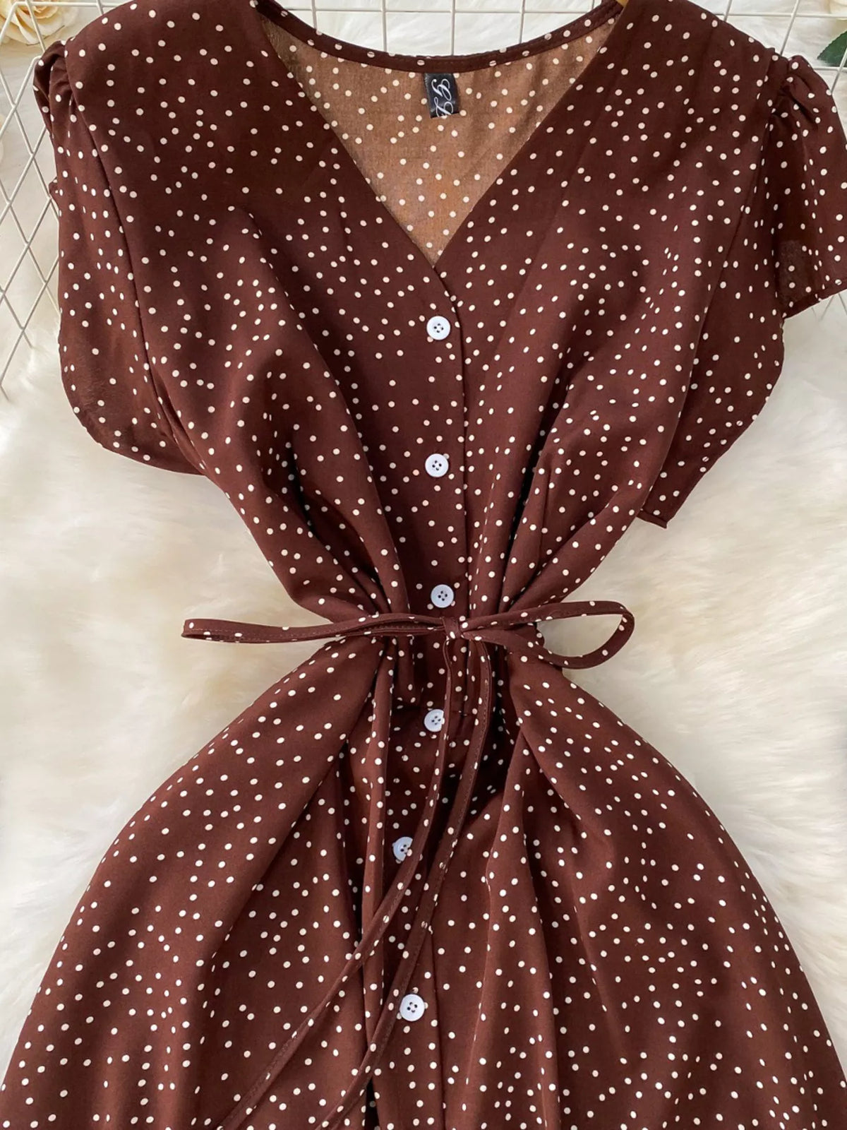 Brown polka dot button up maxi dress side view
