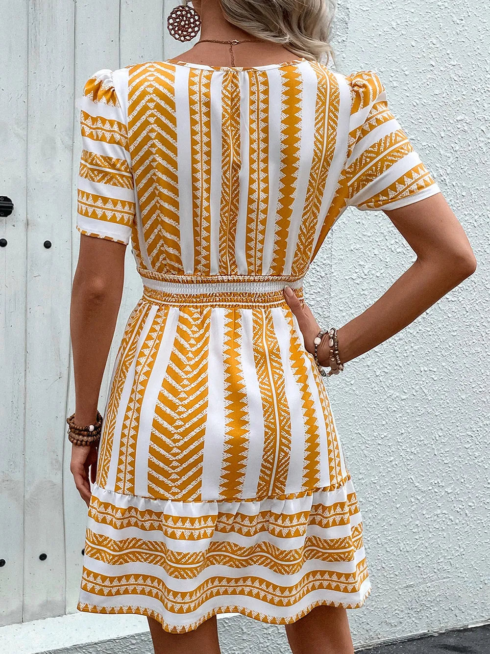 Mustard mini dress notched neckline detail