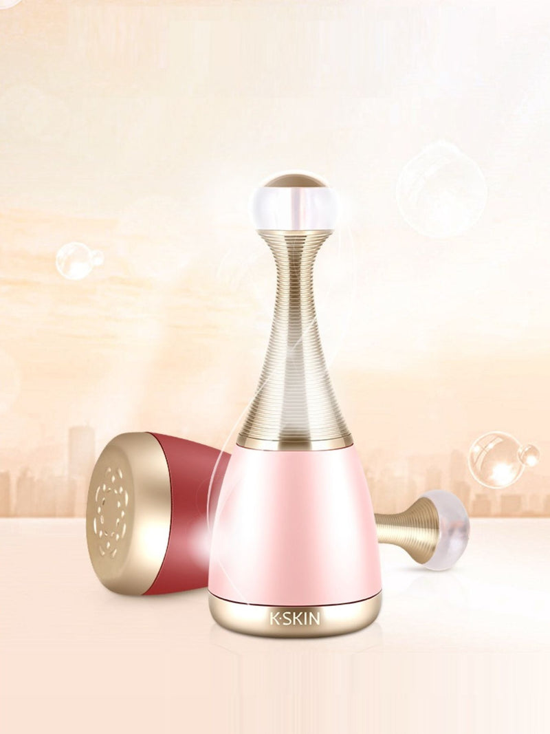 Facial steamer in blush pink on vanity