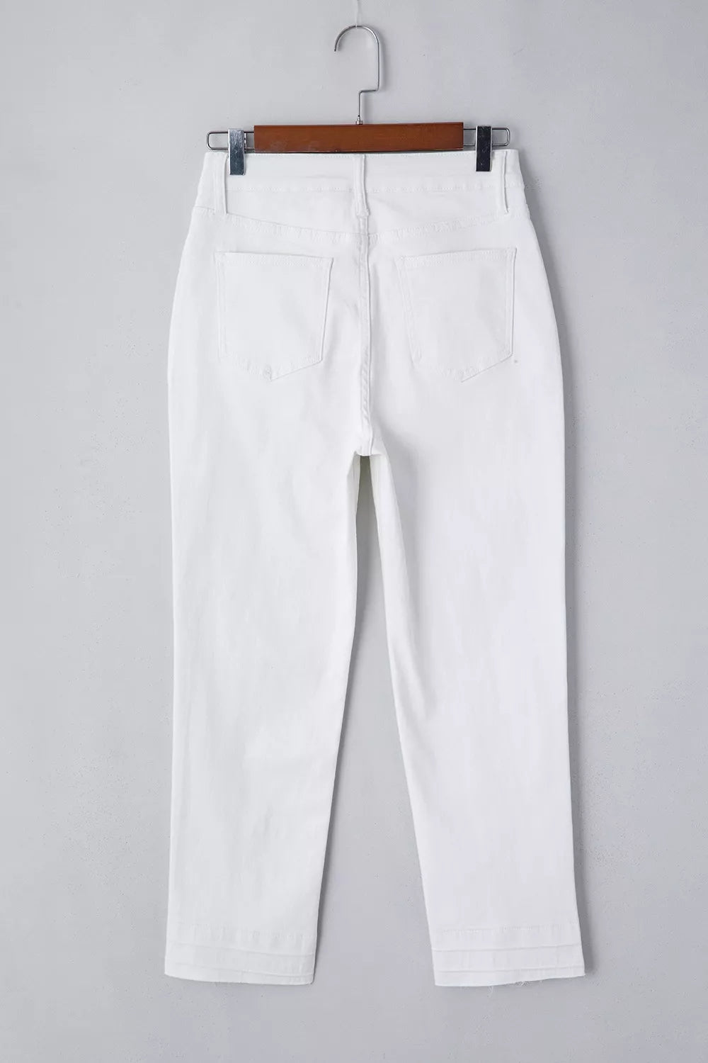 Back view of straight leg white denim jeans