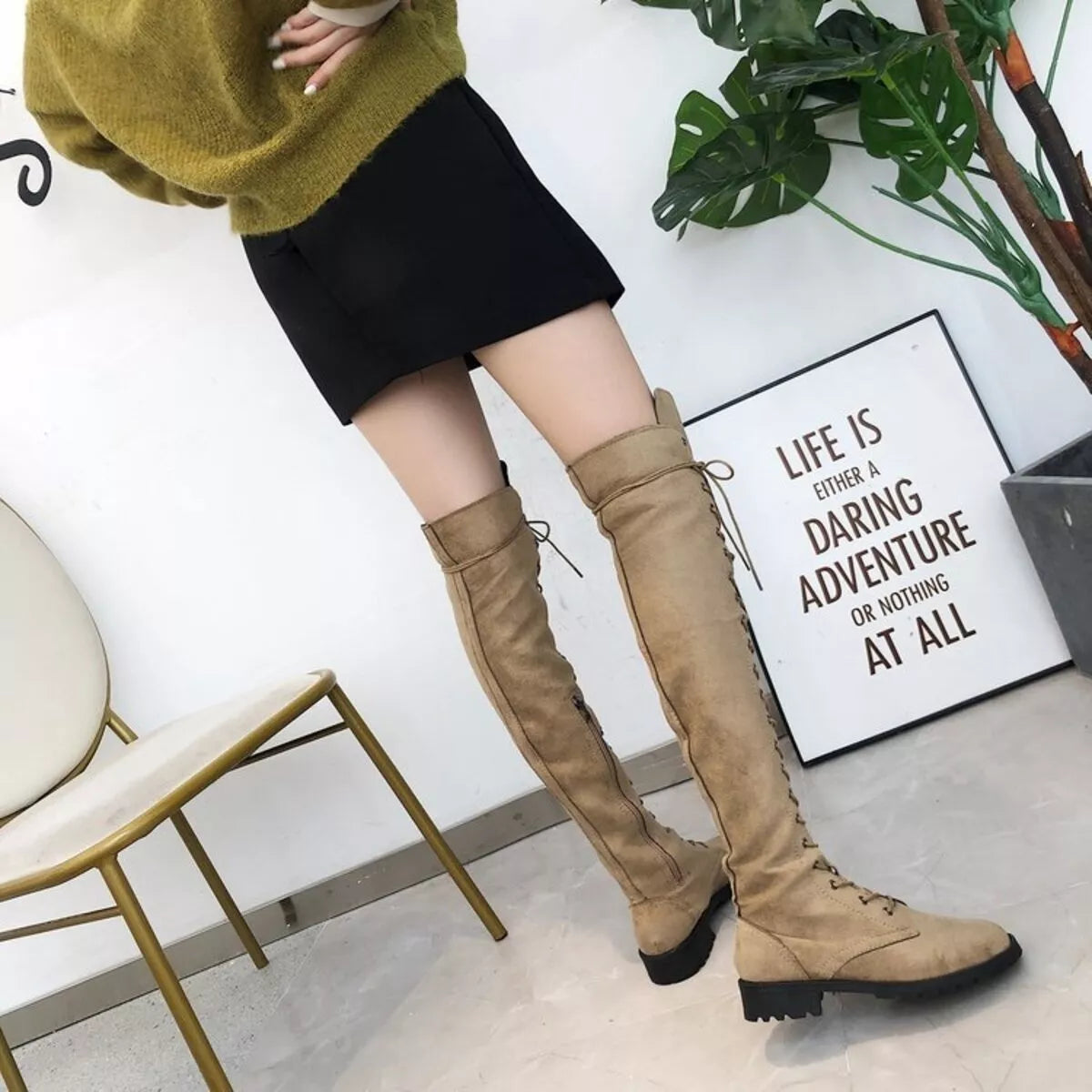 Lace up over the knee boots upper detail