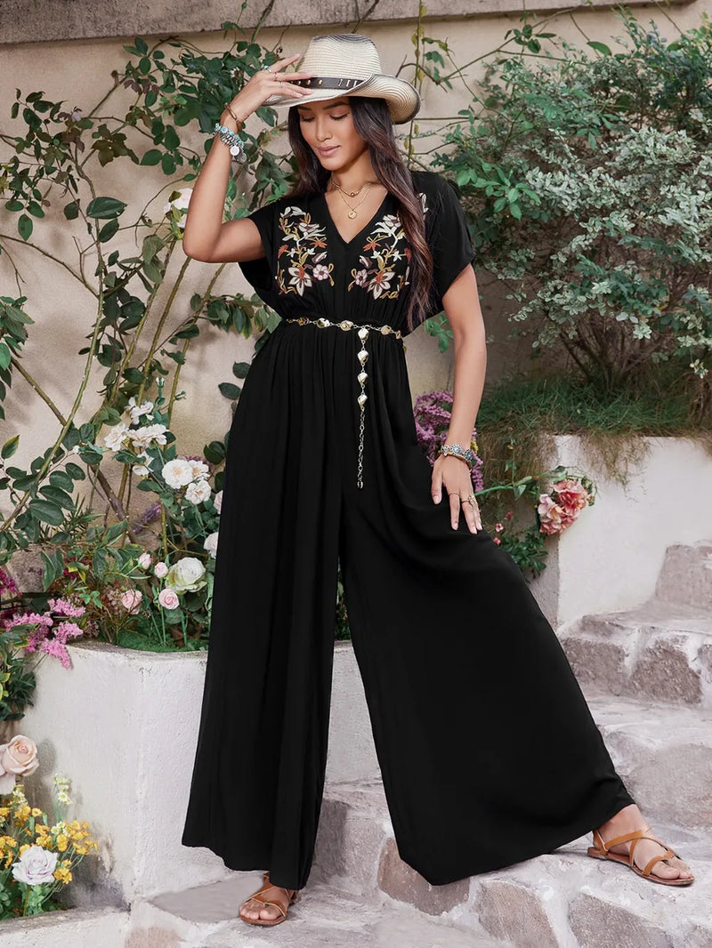 Embroidered ruched black jumpsuit front view