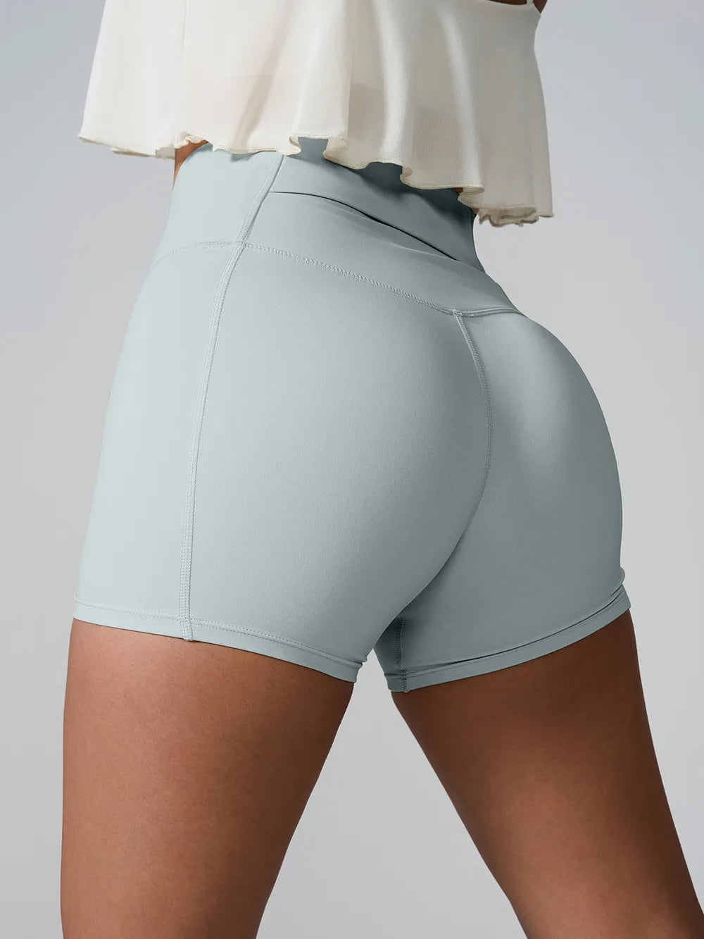 High waist pocket active shorts strap detail