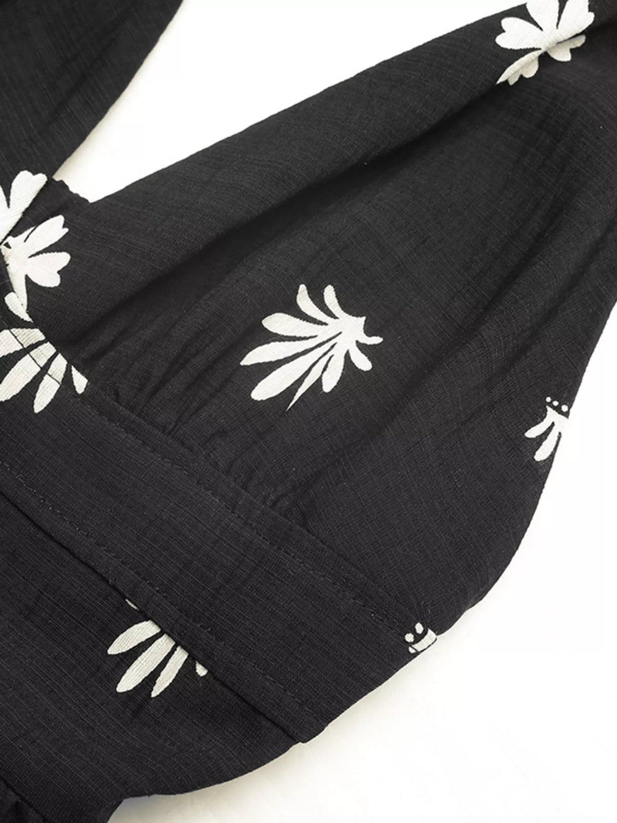 Waist and skirt detail on the printed maxi dress