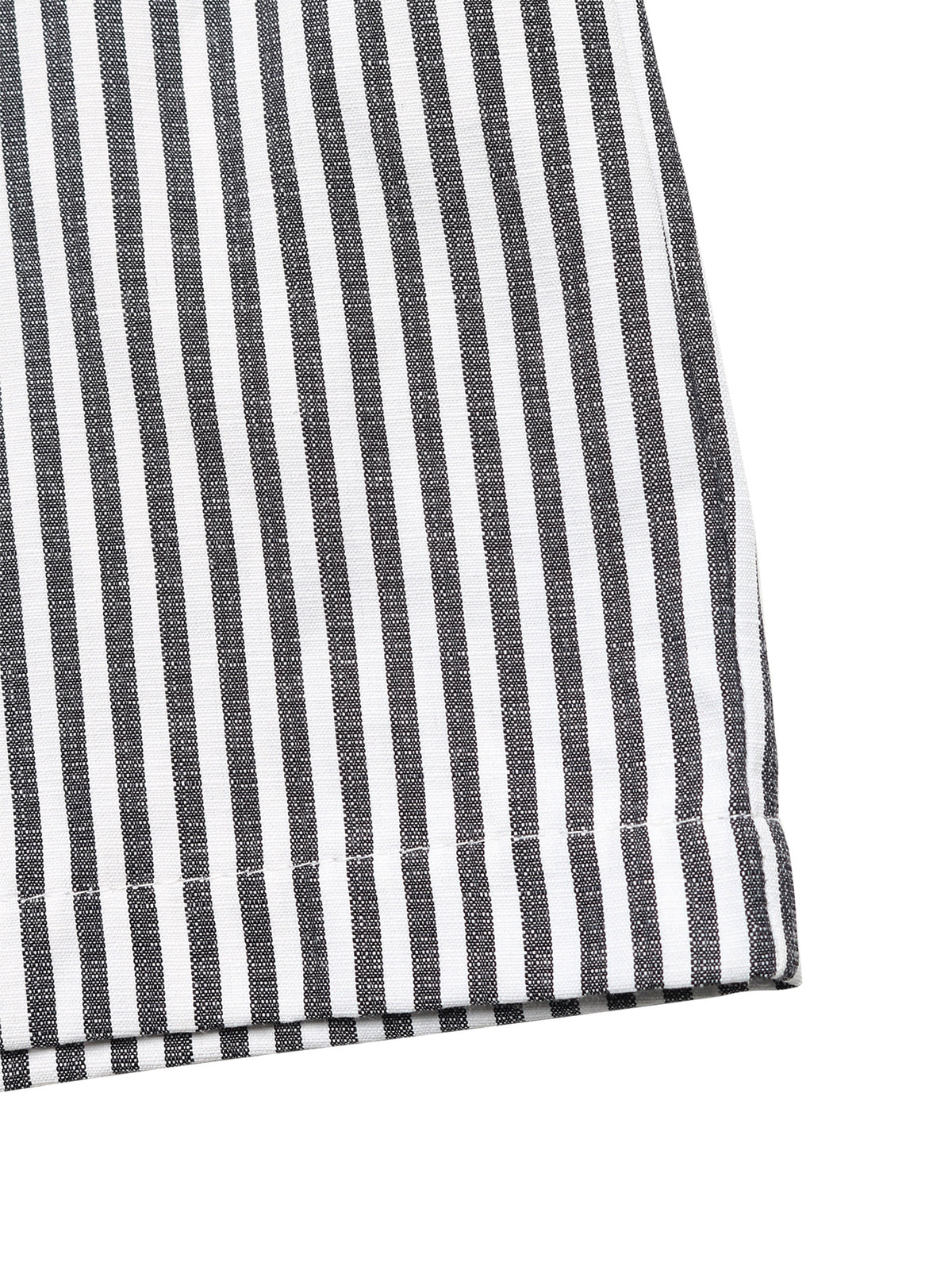 Detail of the waistline on the strapless jumpsuit