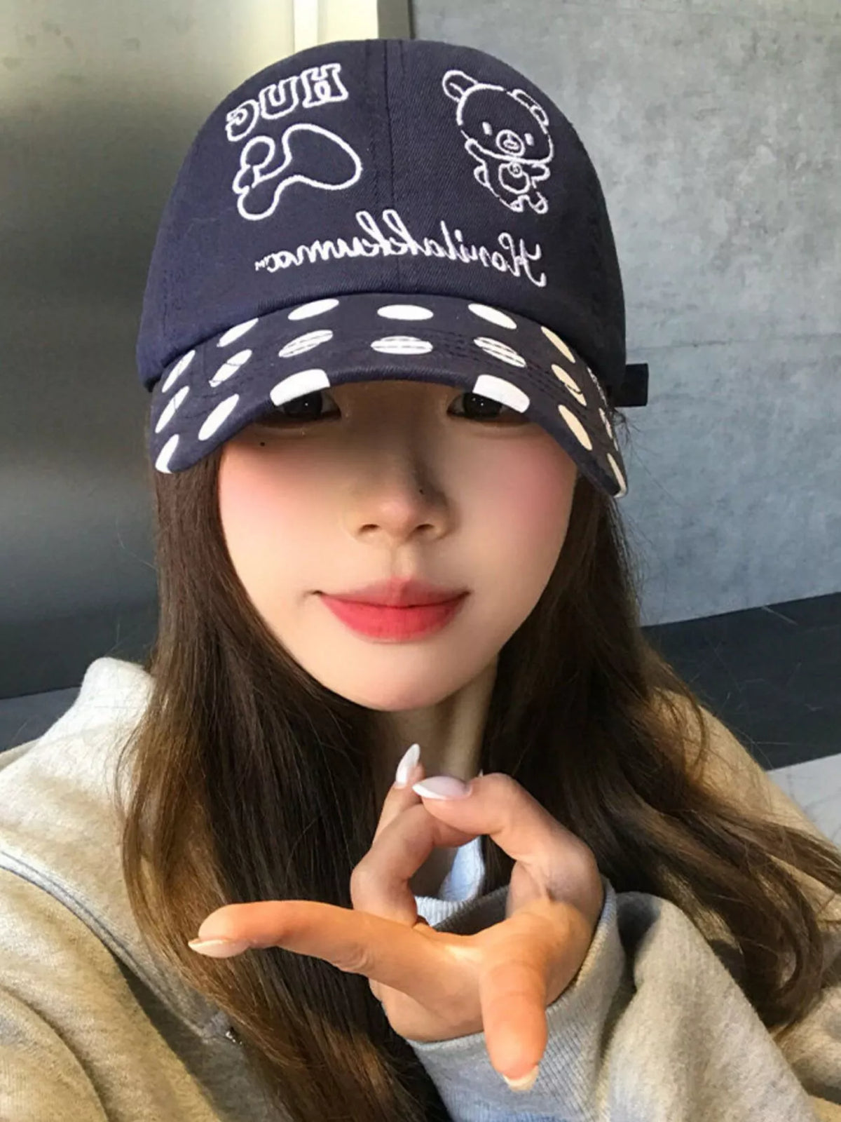 Polka dot baseball cap shown in wine red