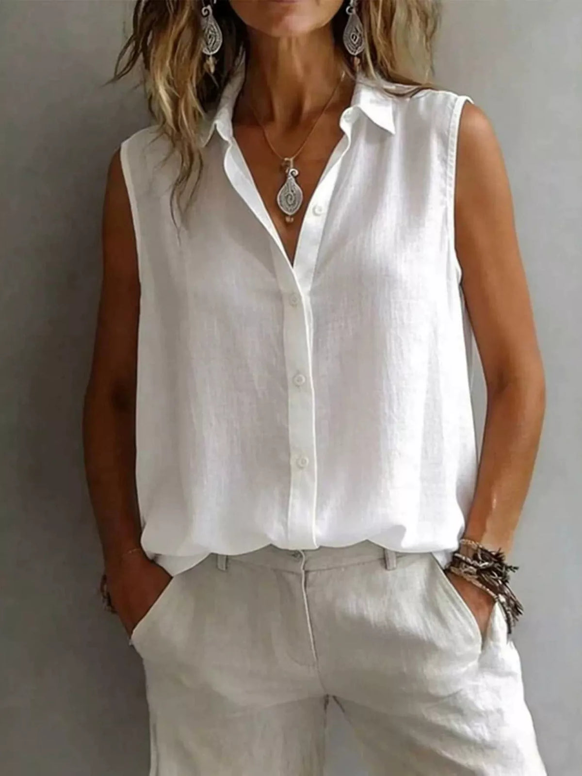 Sleeveless collared button down shirt back view