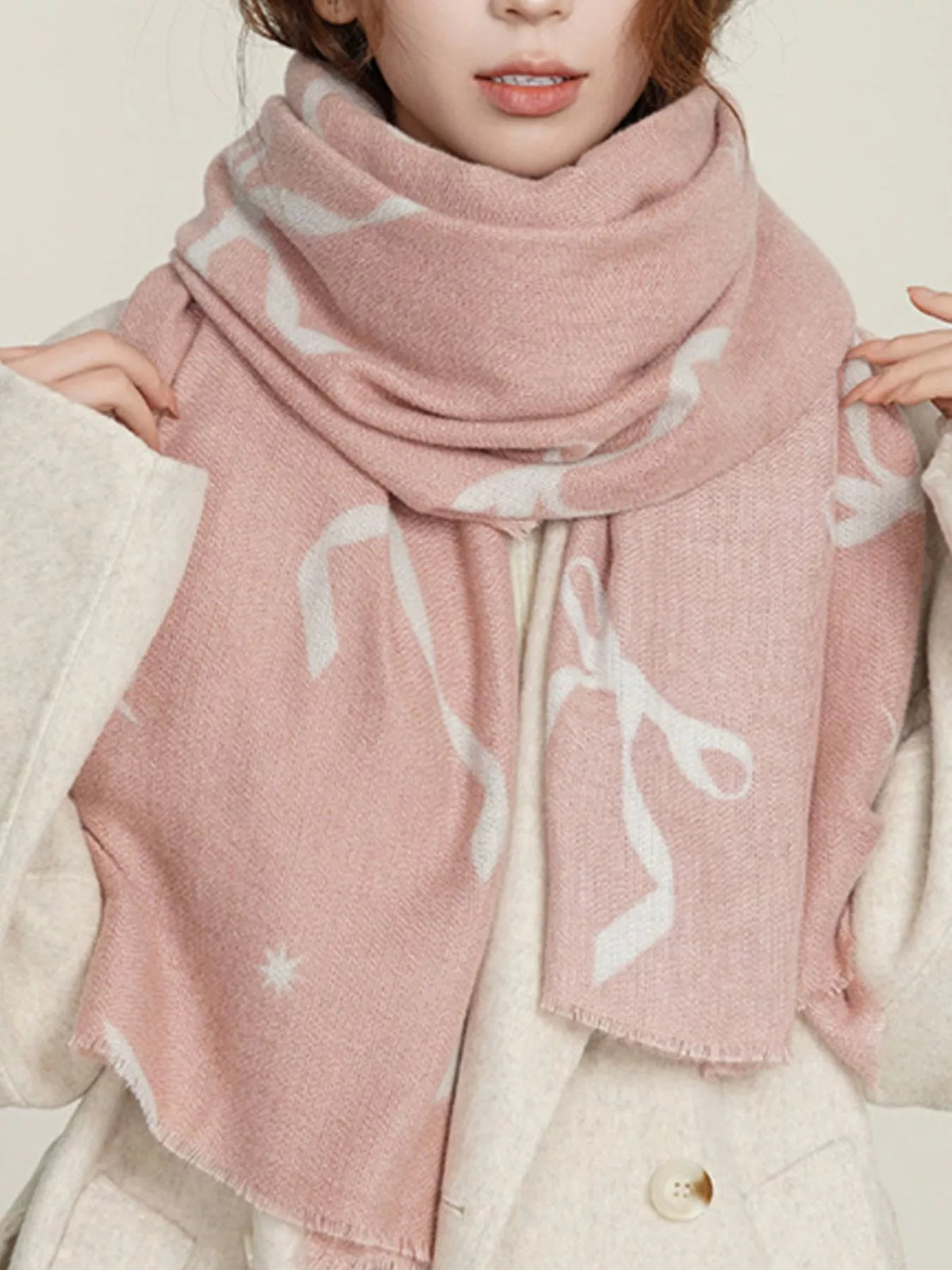 Bow print scarf laid flat