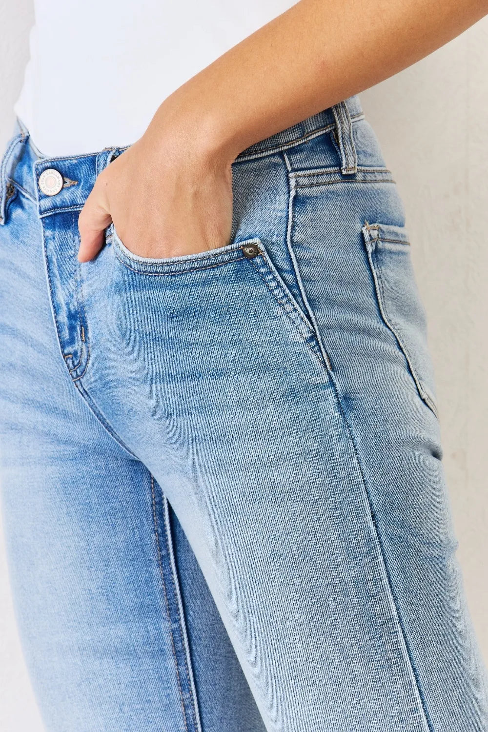 Close up of side slit detail on jeans