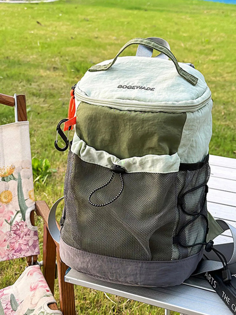 Lightweight outdoor nylon backpack in green front view