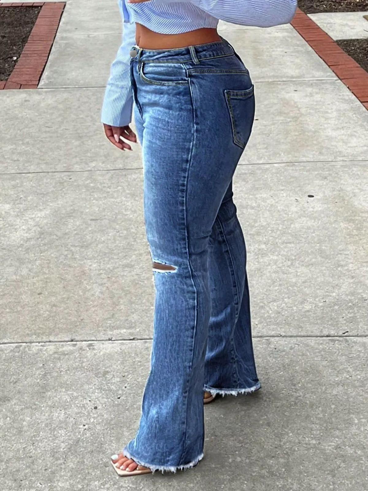 Distressed flare jeans styling
