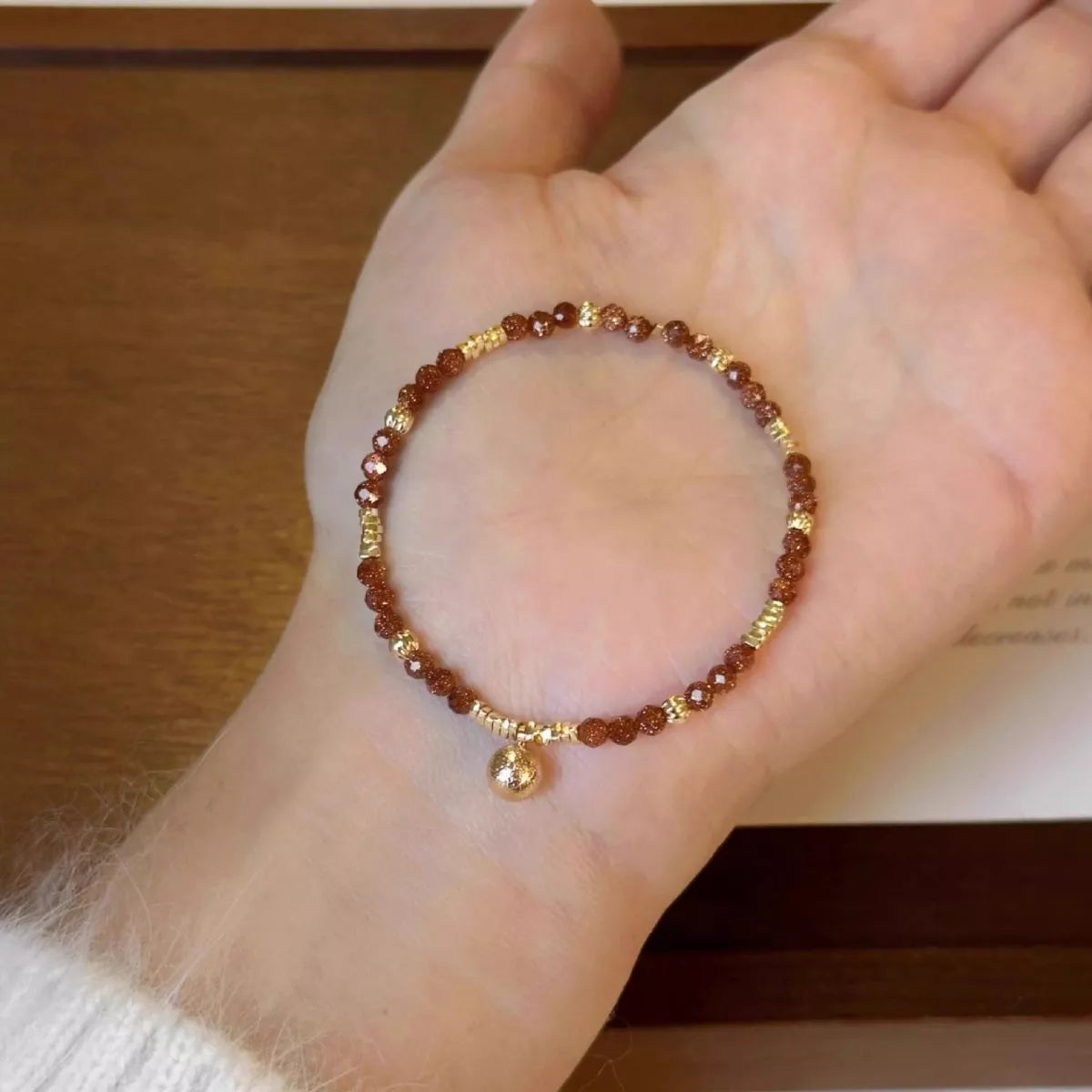Gold plated charm close up