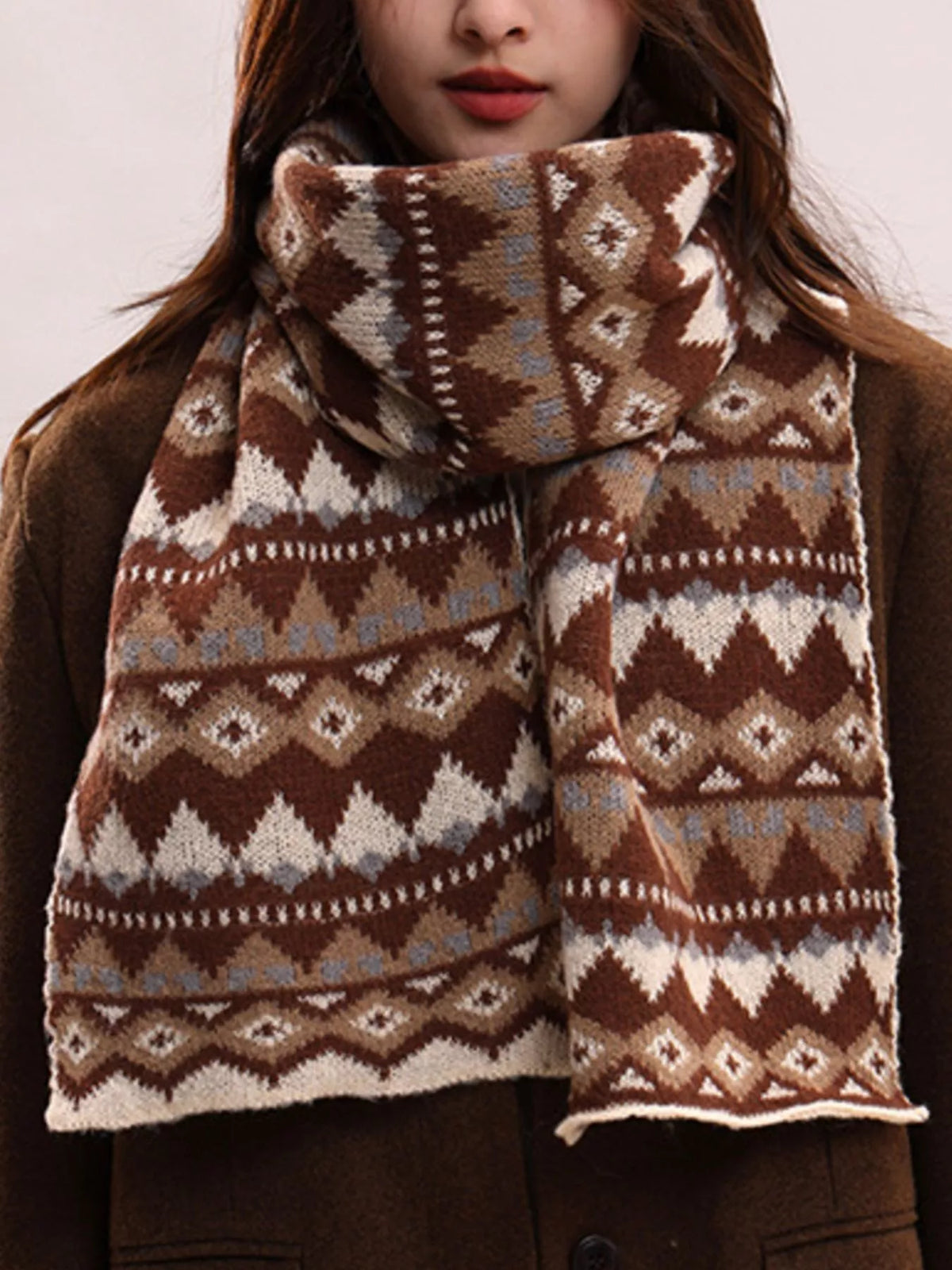 Geometric knitted scarf shown in an alternate style