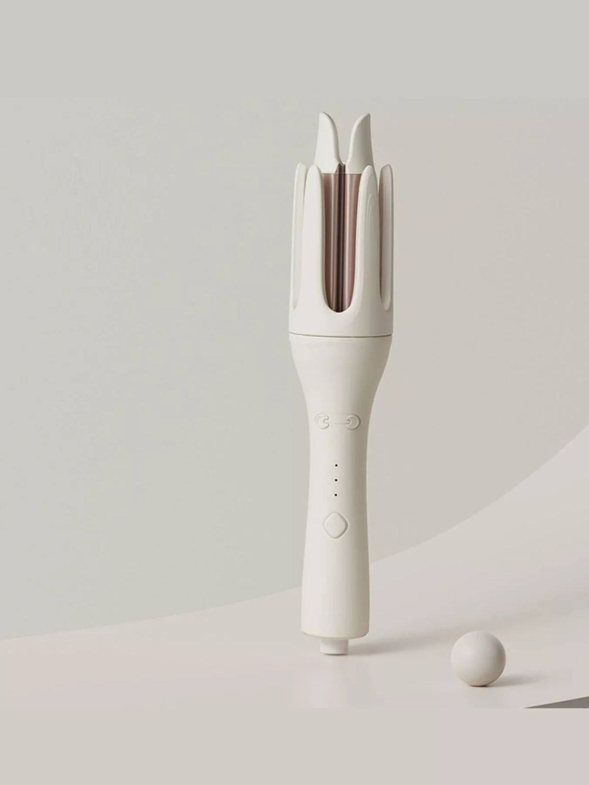 Bouncy curls created with rotating curling iron