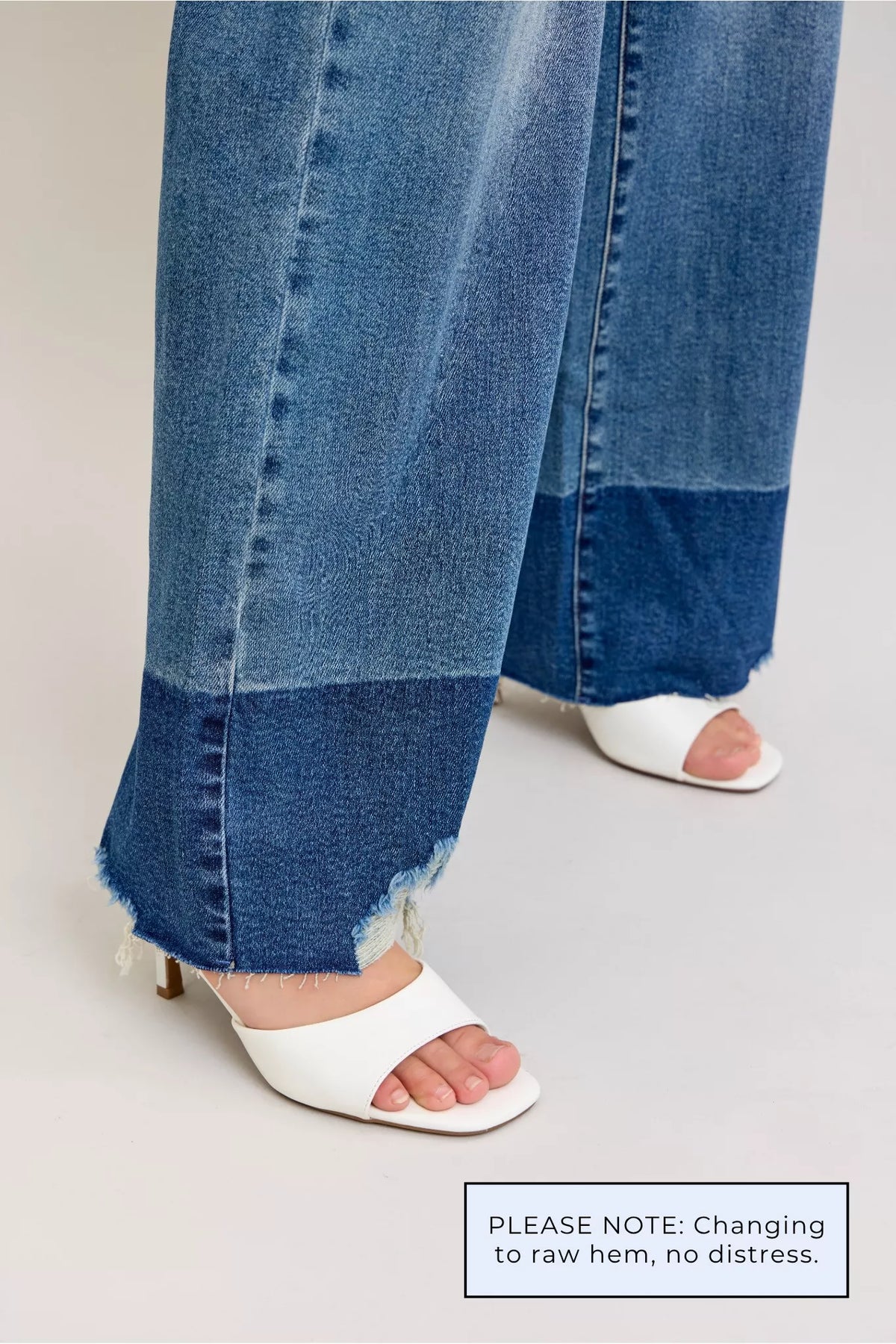 Judy Blue raw hem dark column jeans angled view