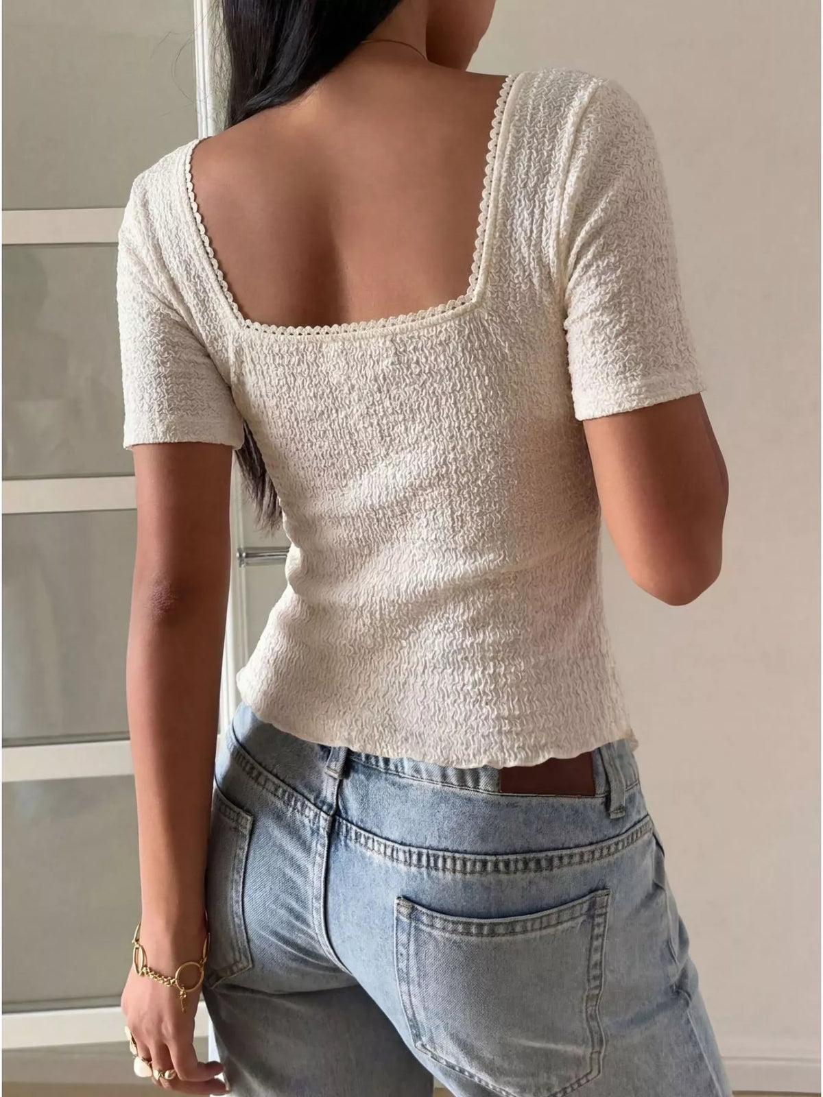 Back view of the sweetheart neck ruffle top in white
