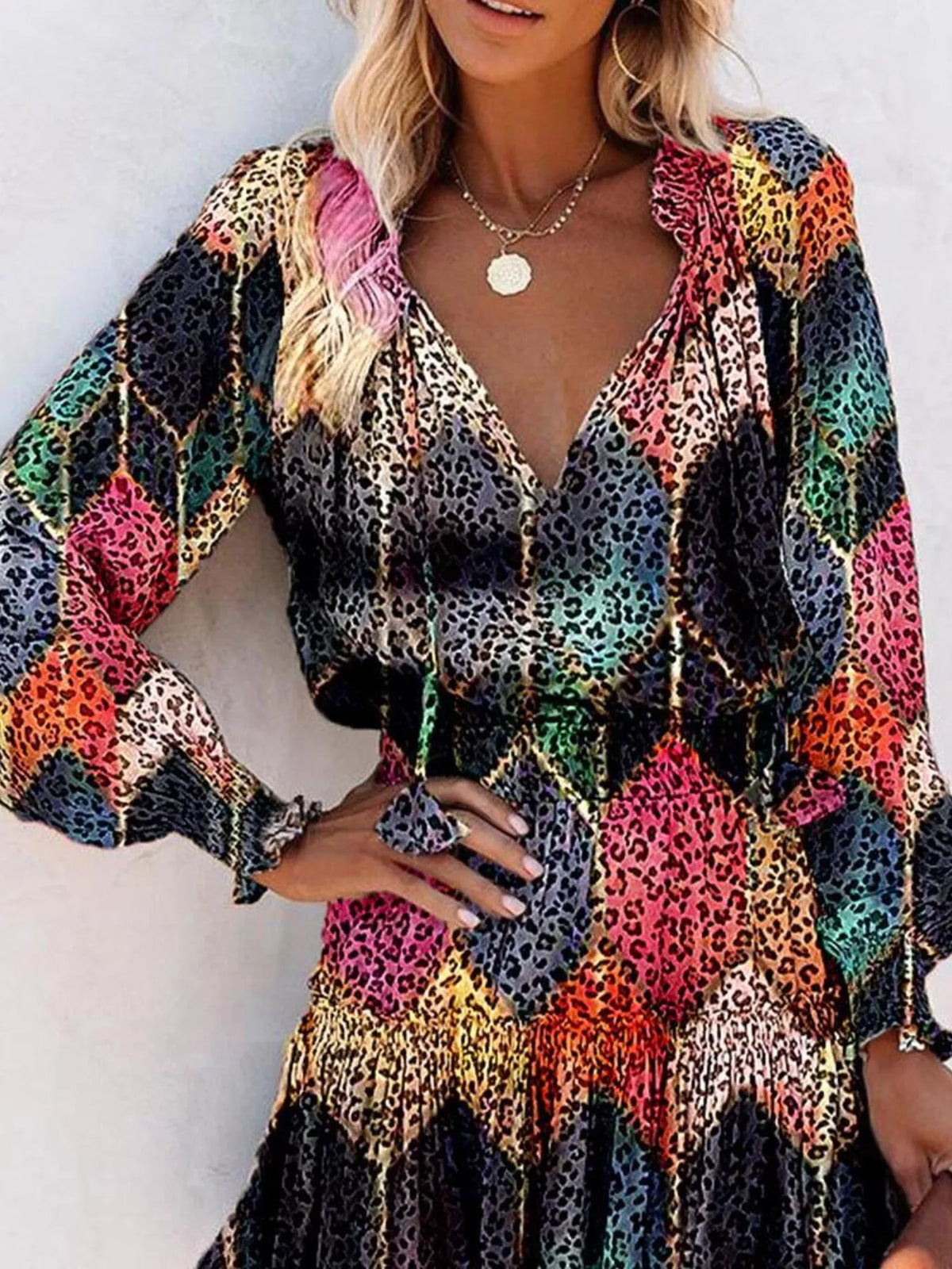 Tie neck lantern sleeve tiered dress front view