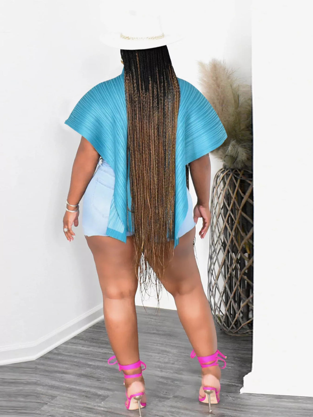 Light blue turtleneck cape top side view