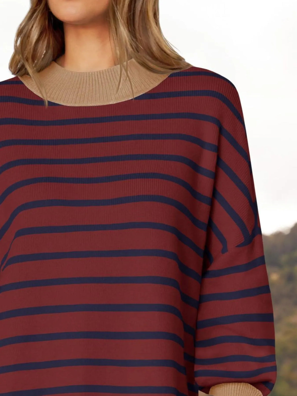 Striped long sleeve sweater flat lay