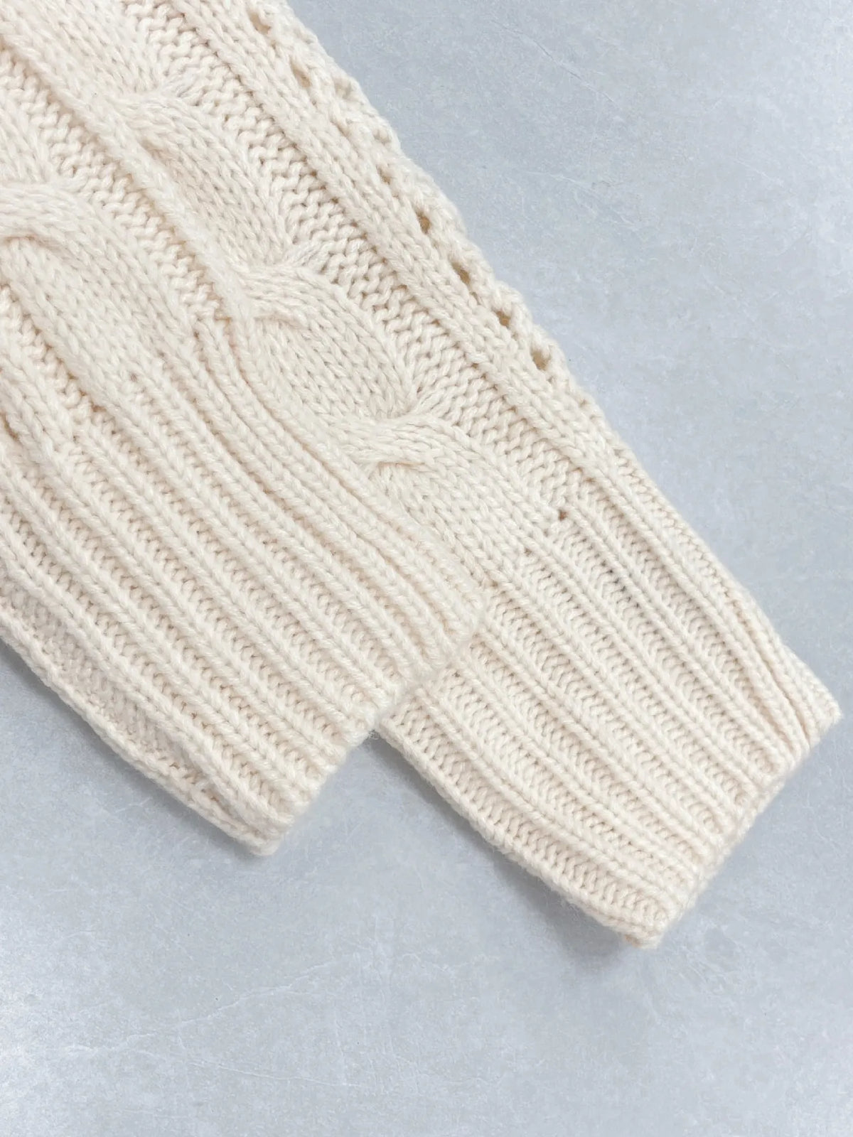 Cable knit belted button front cardigan, full length view