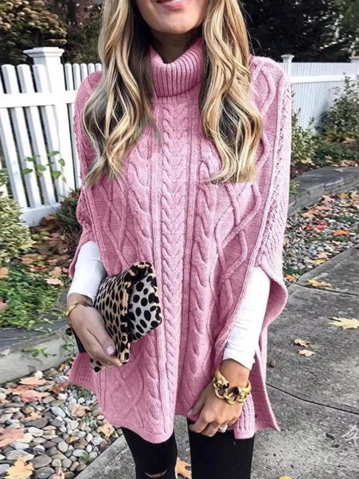 Chunky cable knit turtleneck poncho front view