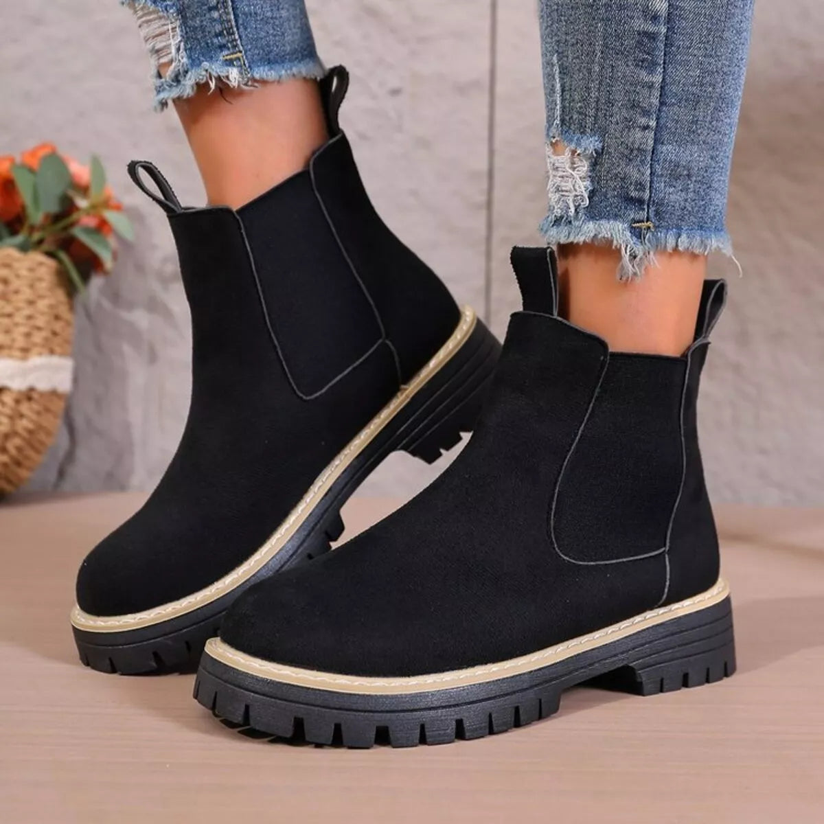 black round toe platform boots front view