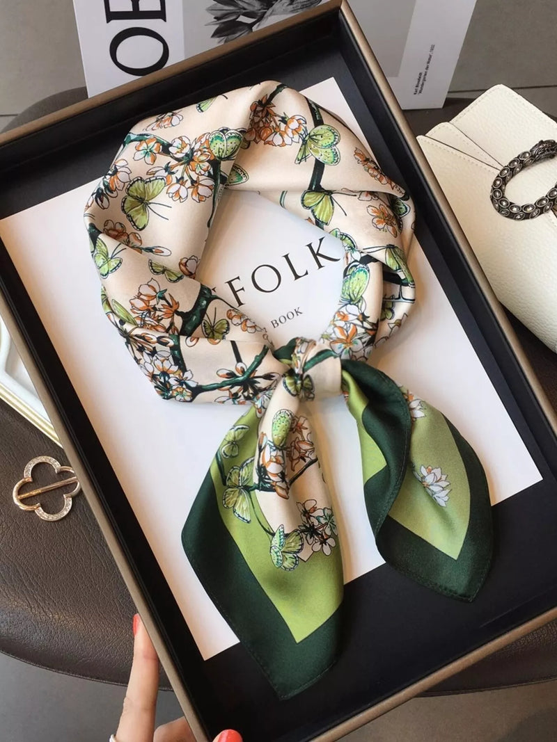 Floral print silk scarf in a rich dark green tone