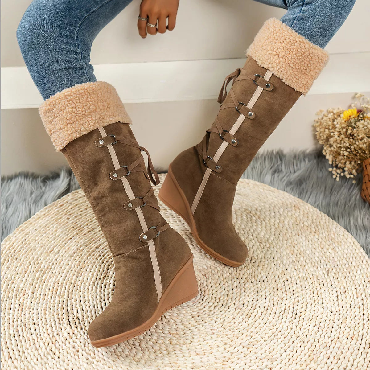 Round toe wedge boots paired with denim