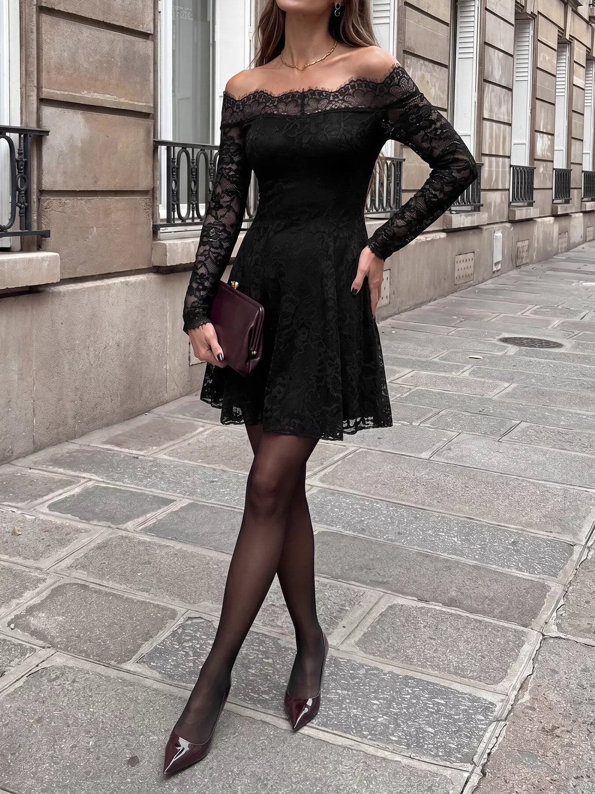 Lace mini dress shown from the side