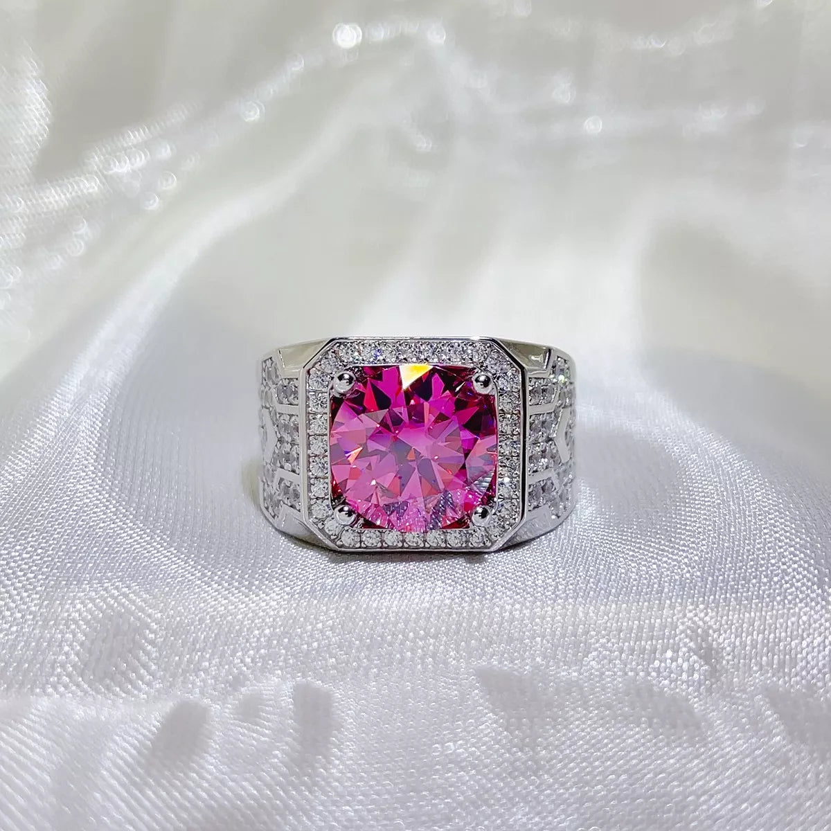 Close up of the pink moissanite stone and sterling silver band